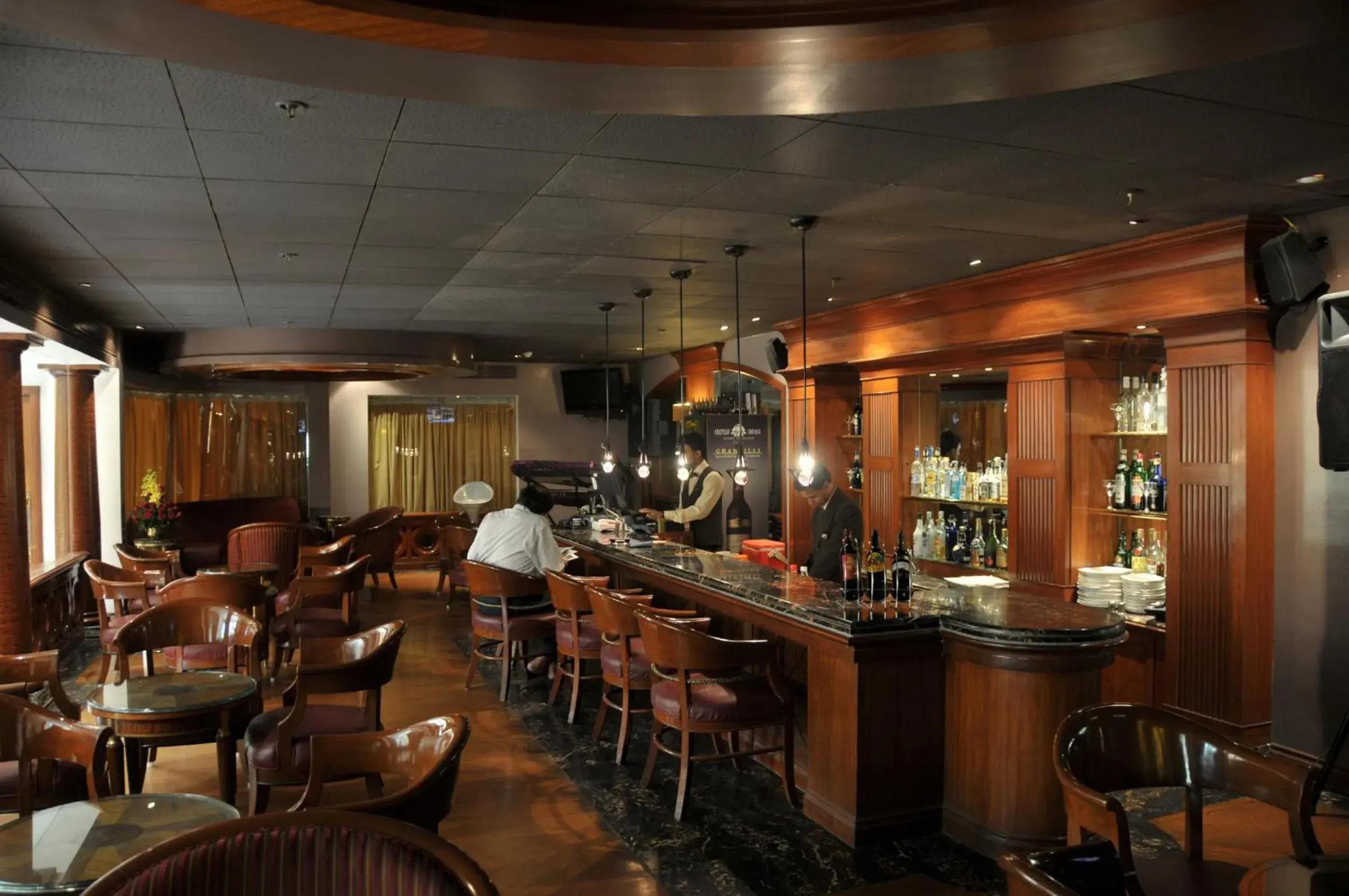 Lounge or bar in Ramada Plaza By Wyndham Palm Grove Lounge or bar in Ramada Plaza By Wyndham Palm Grove