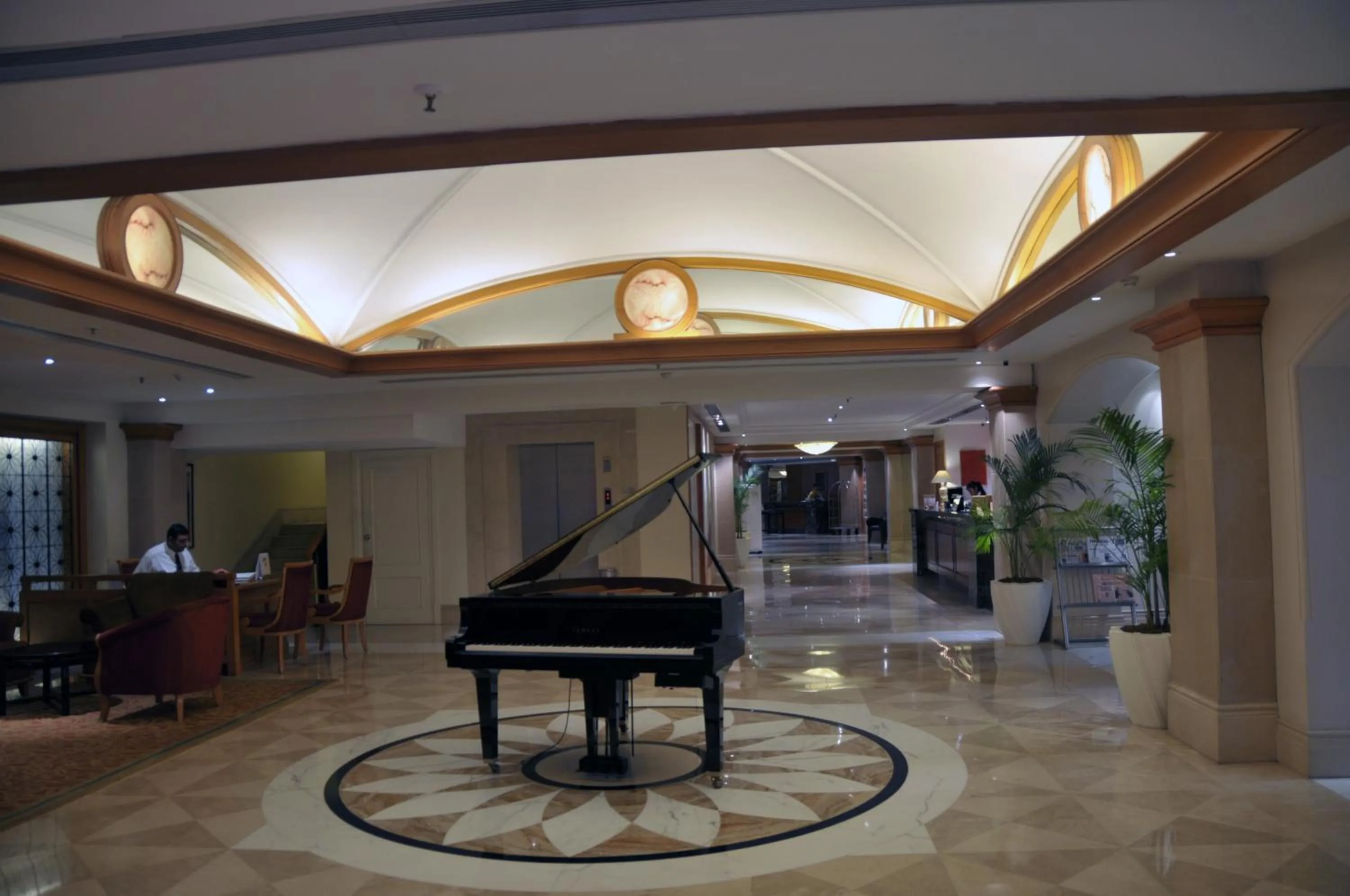 Lobby or reception in Ramada Plaza By Wyndham Palm Grove