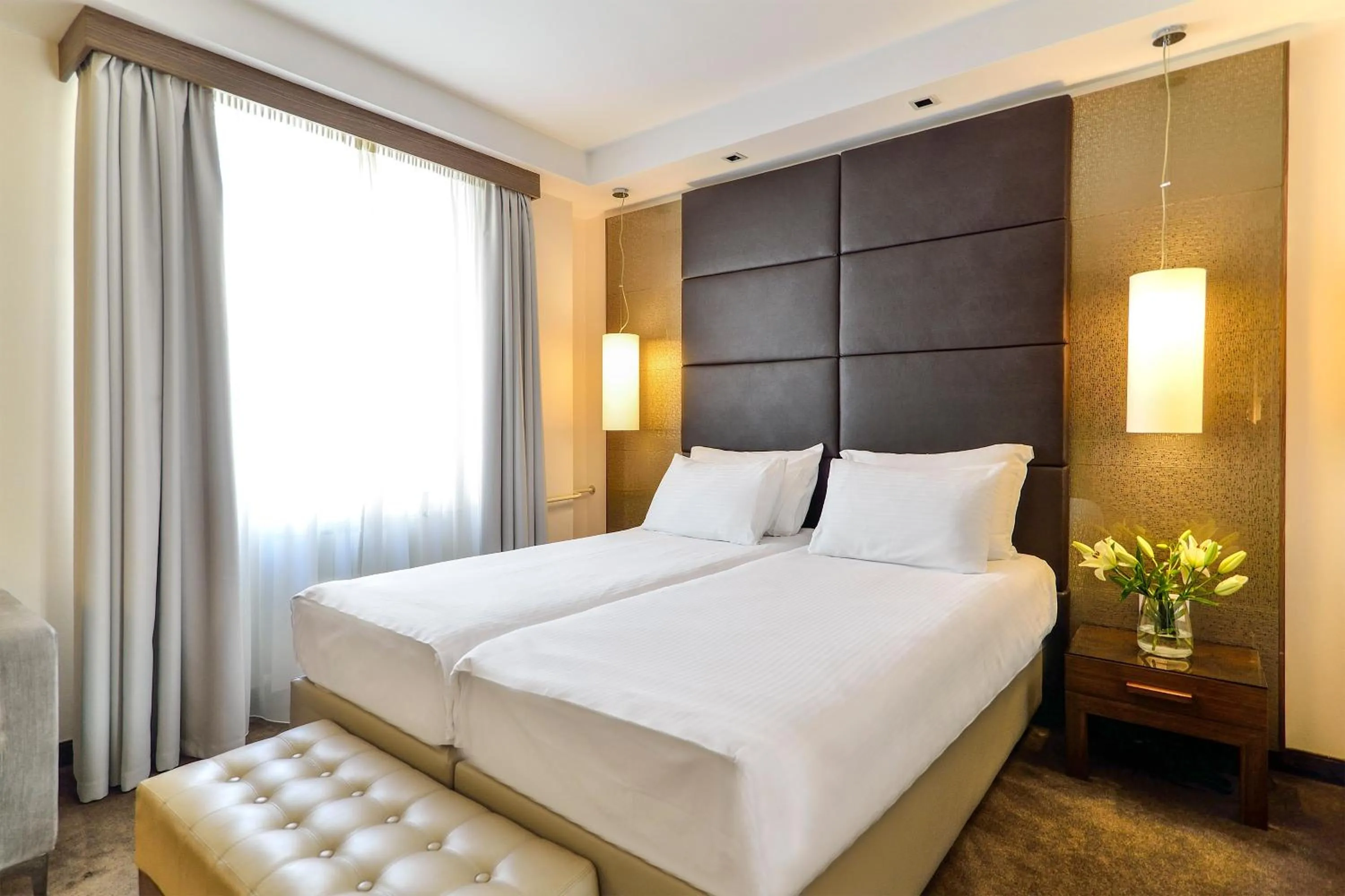 Bed in Belgrade Art Hotel, a member of Radisson Individuals