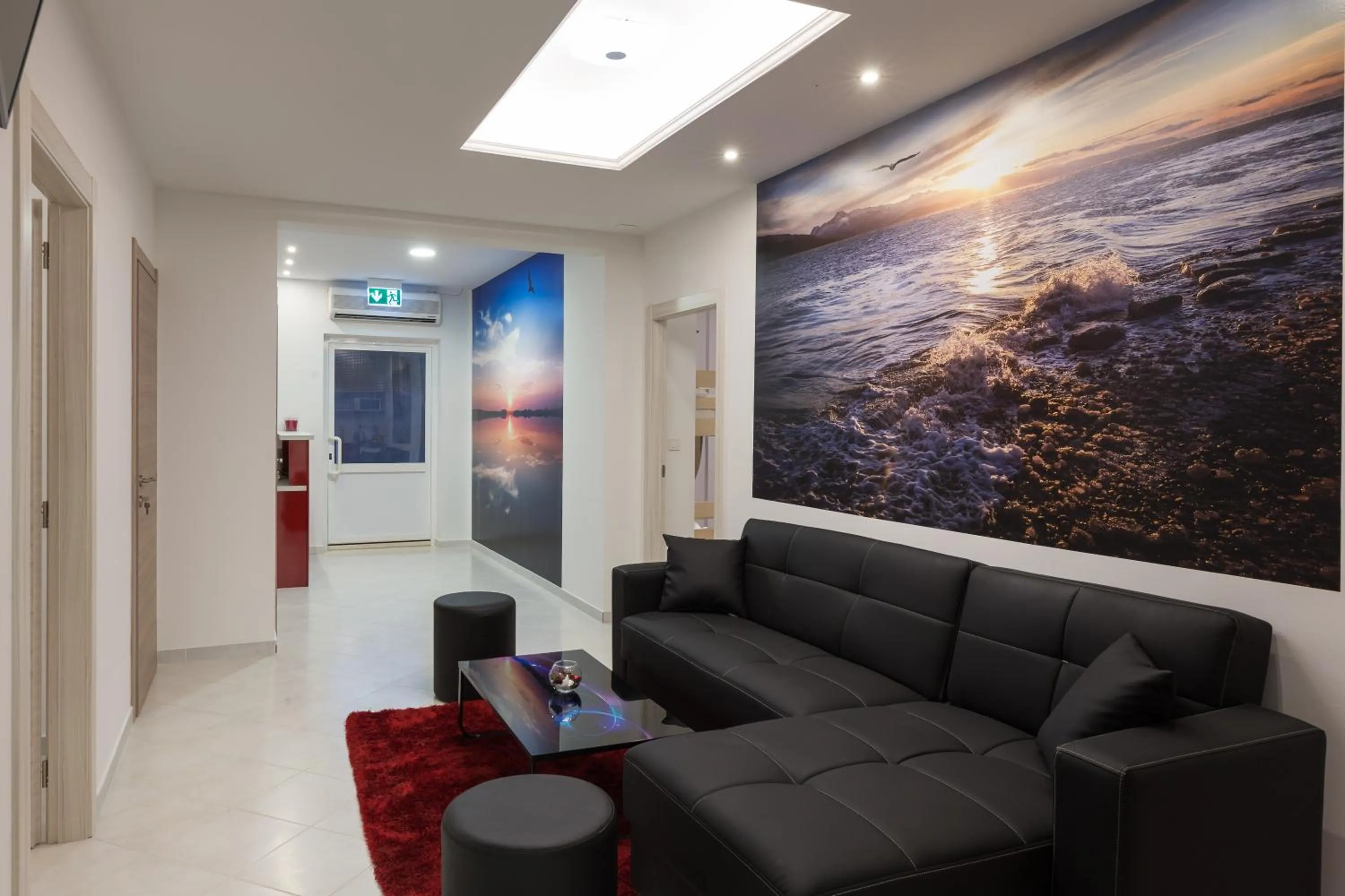 Communal lounge/ TV room in Hostel Free Bird
