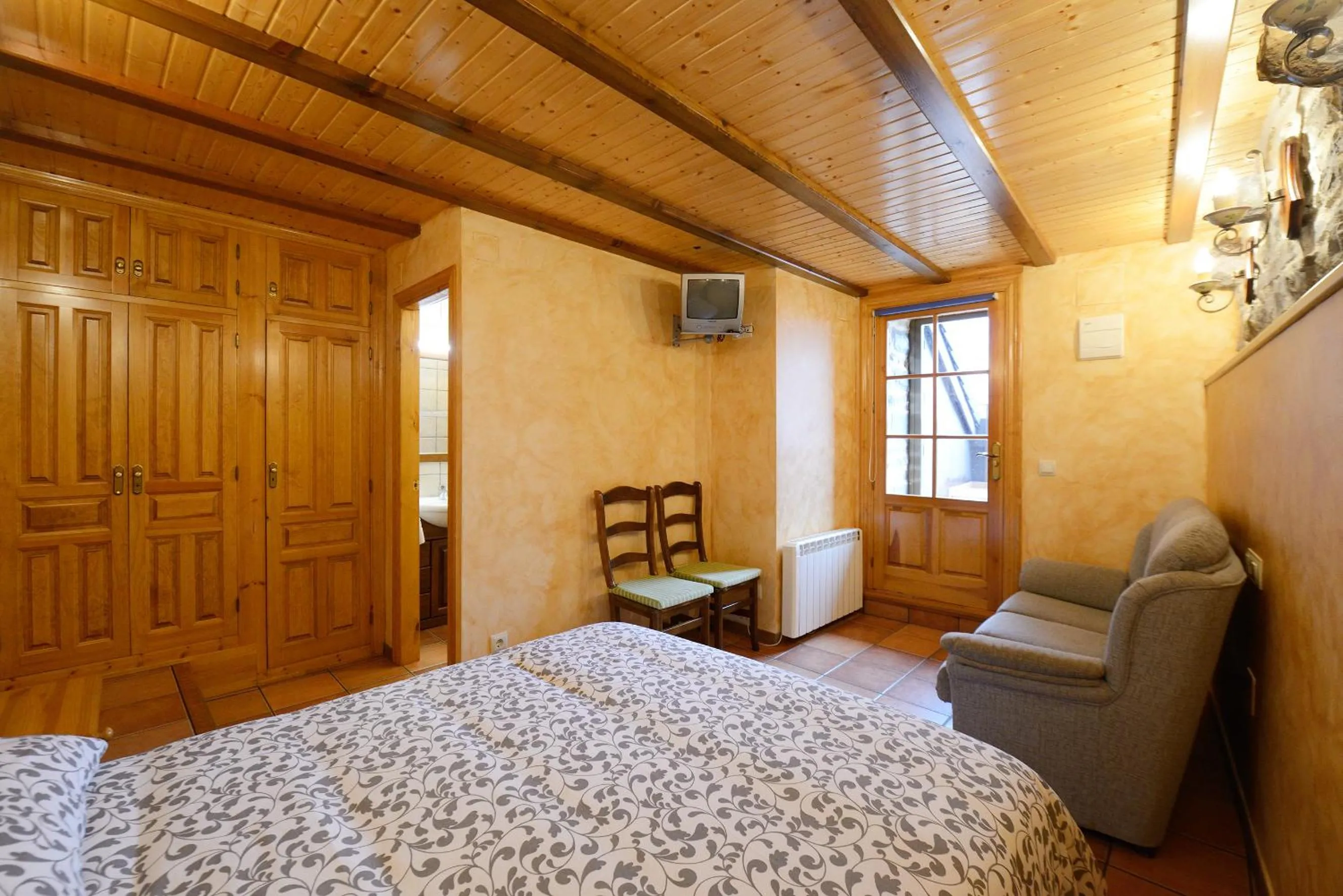 Bed in Habitación El Mirador Casa Cajal