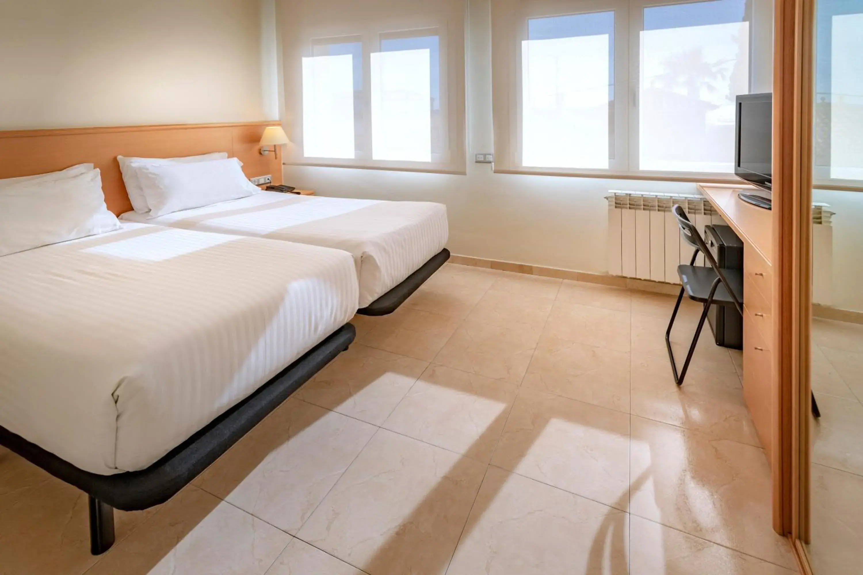 Bed in Apartments Playa de Castelldefels Bed in Apartments Playa de Castelldefels