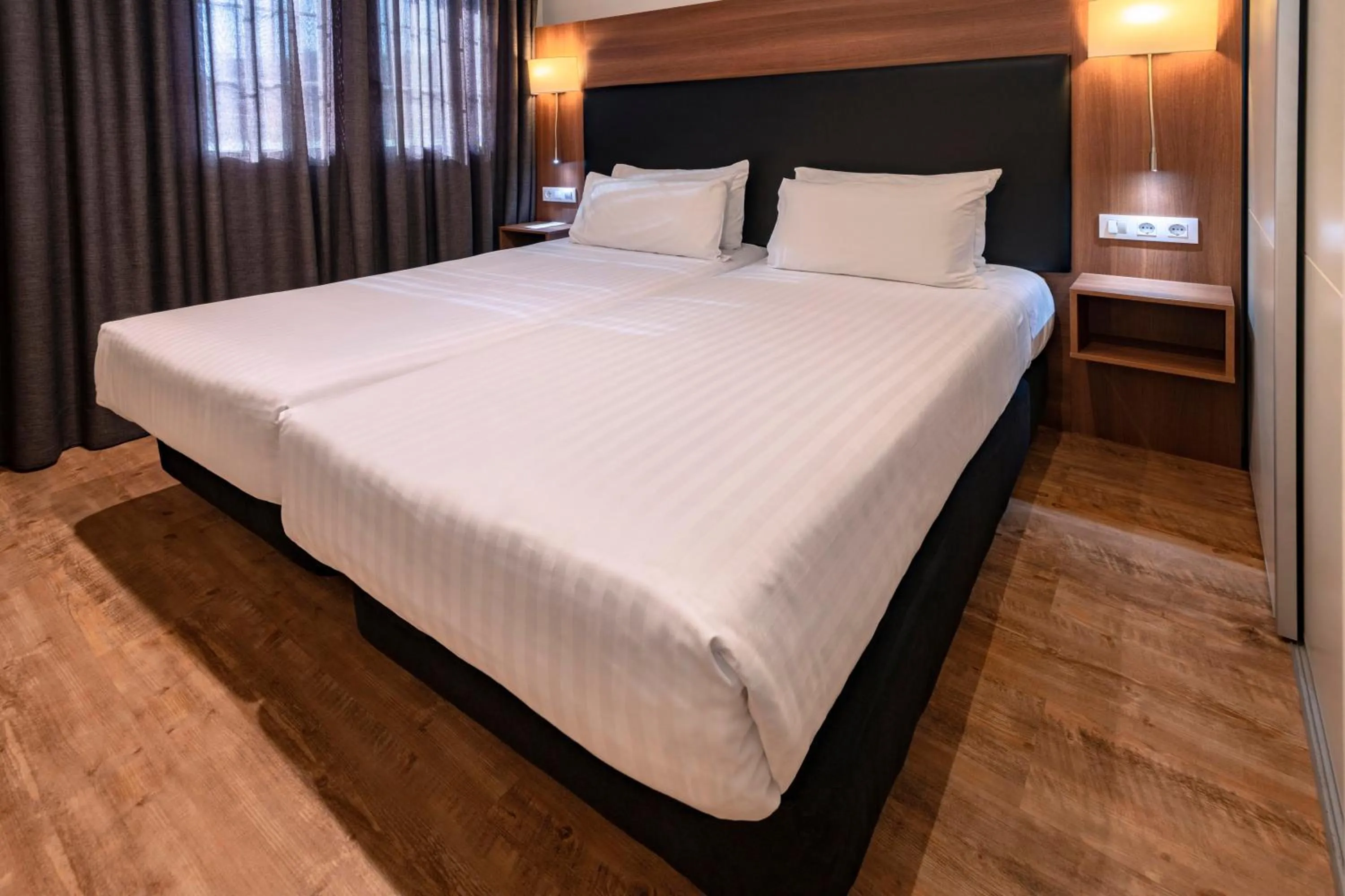 Bed in Apartments Playa de Castelldefels