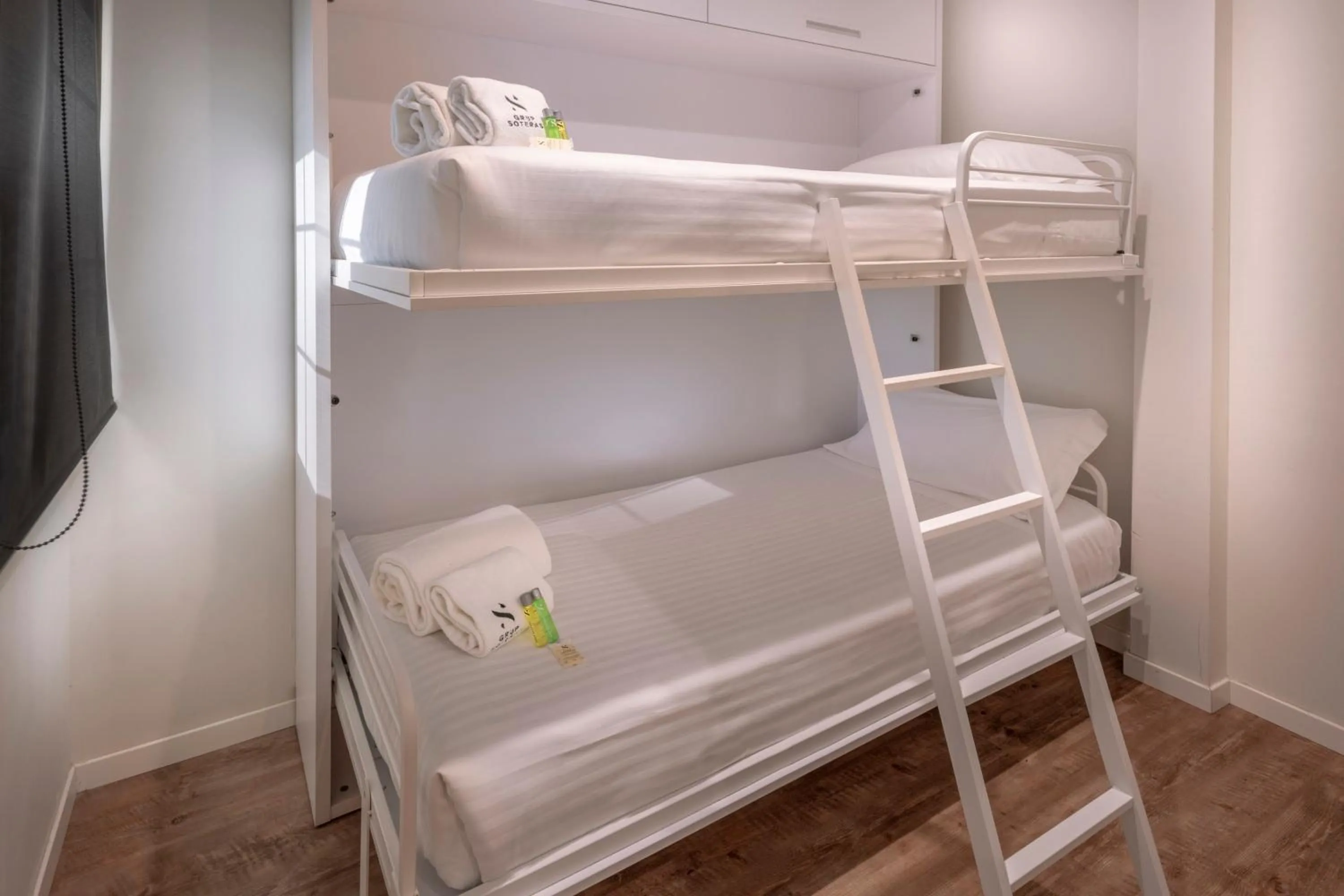 Bed in Apartments Playa de Castelldefels