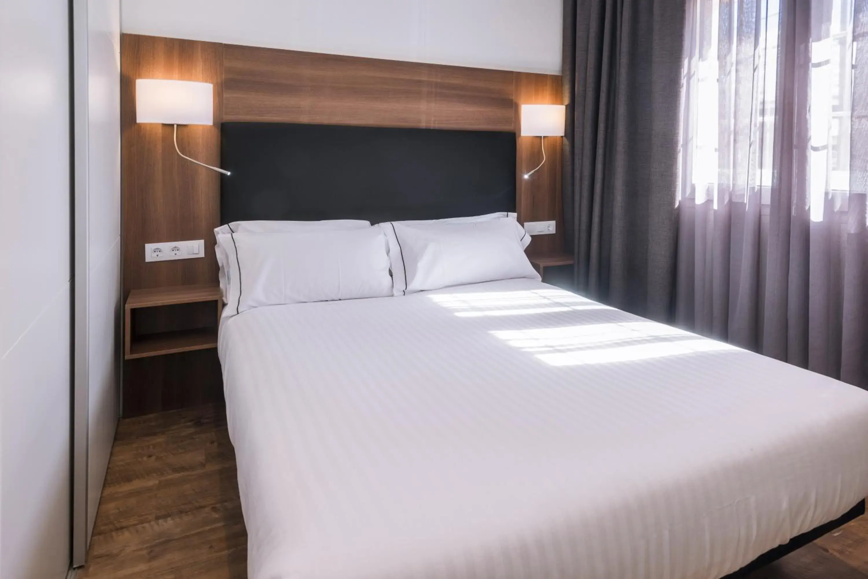 Bed in Apartments Playa de Castelldefels Bed in Apartments Playa de Castelldefels