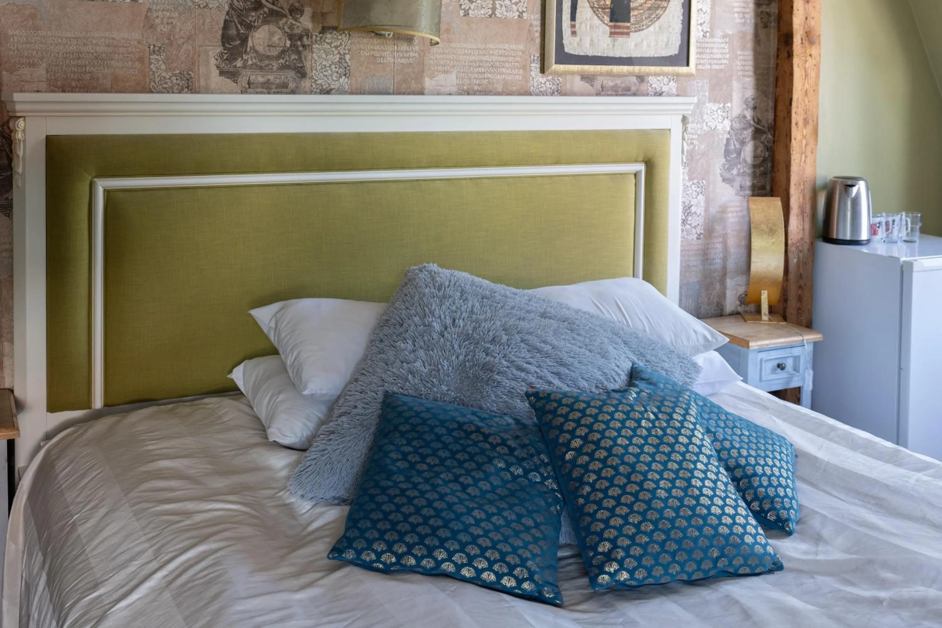 Bed in Paivilla Boutique Hotel