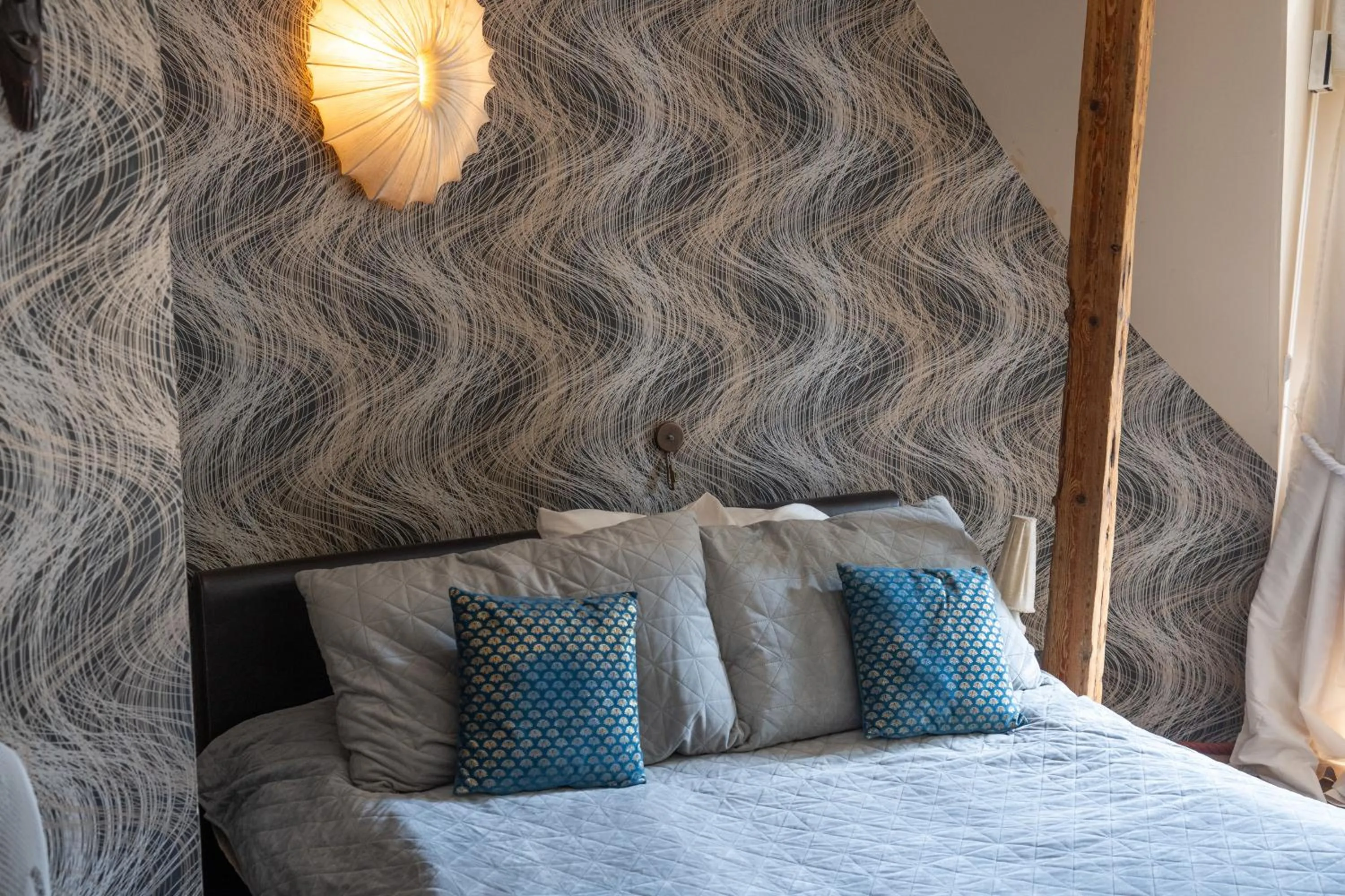 Bed in Paivilla Boutique Hotel