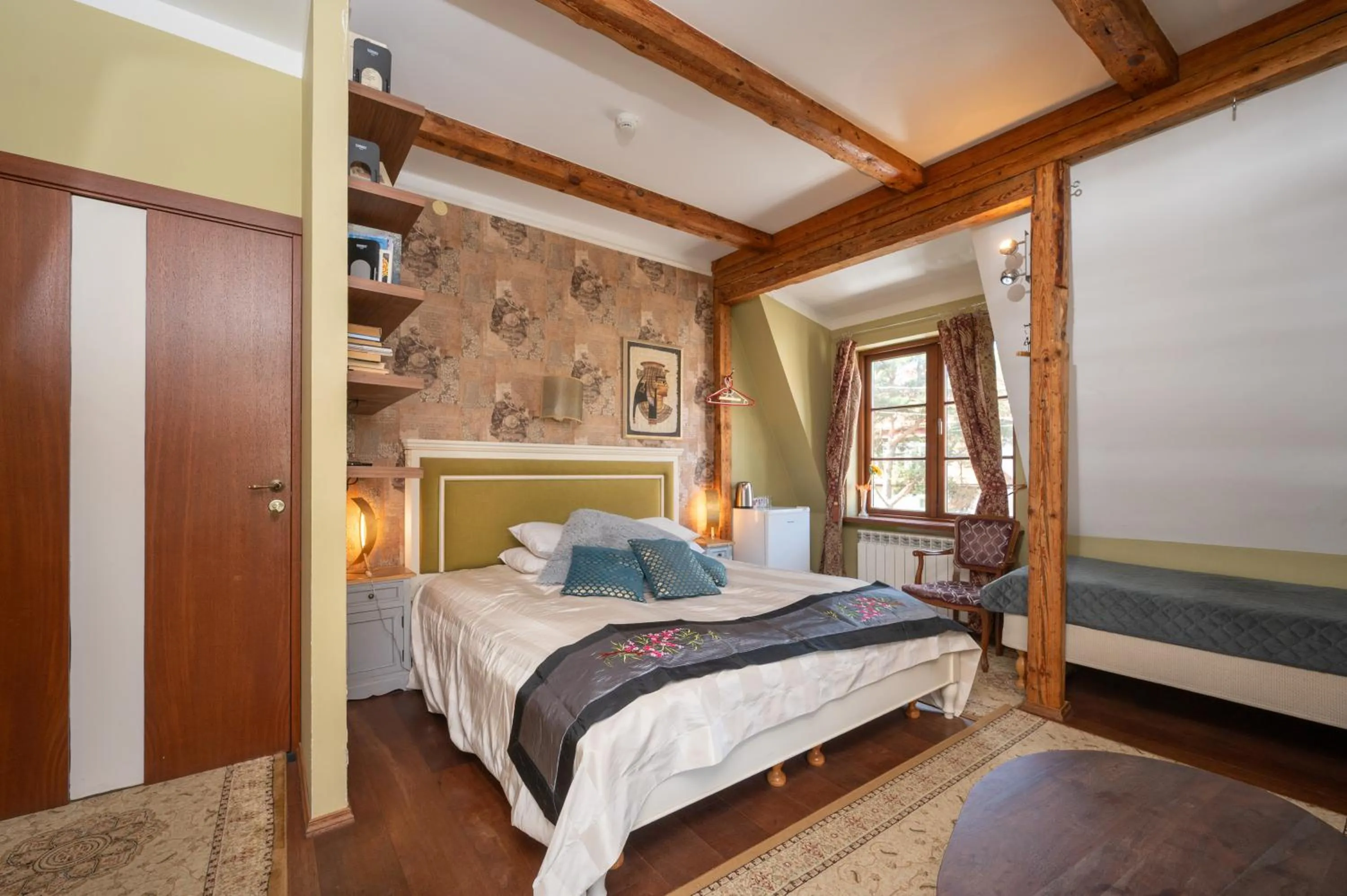 Bed in Paivilla Boutique Hotel