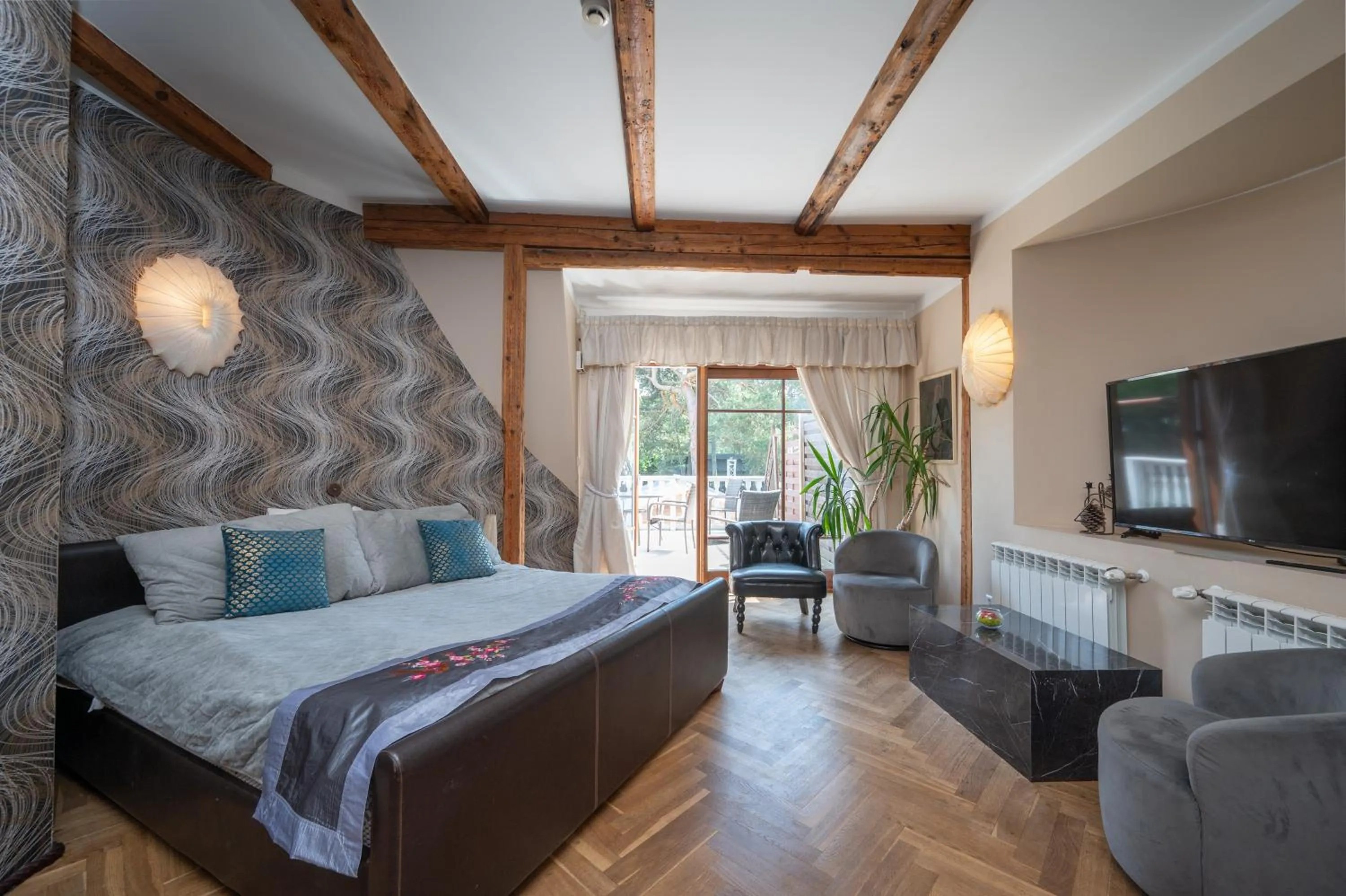 Bed in Paivilla Boutique Hotel