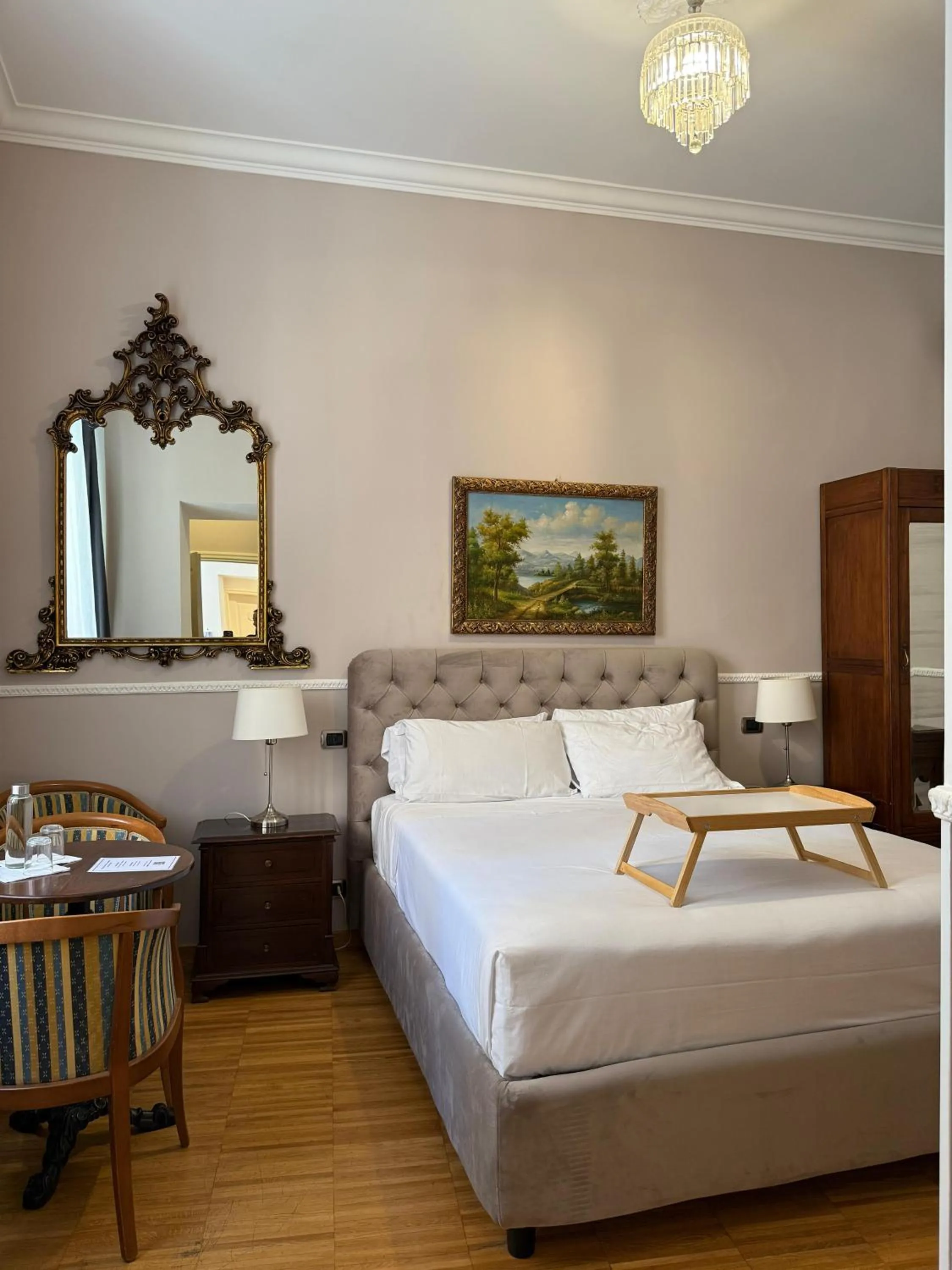 Bed in I TRE MOSCHETTIERI - D'ARTAGNAN Luxury Guest House