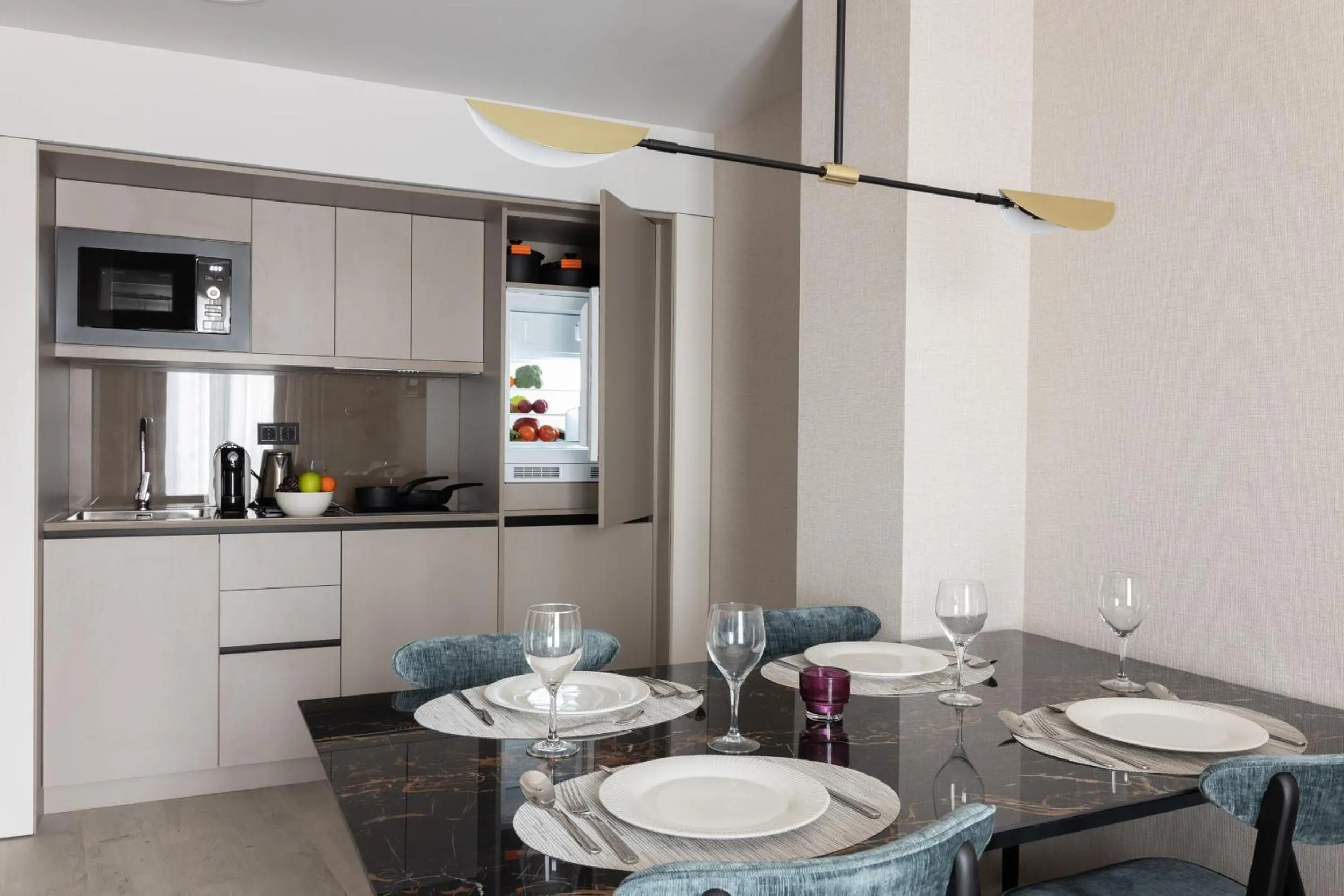 Kitchen or kitchenette in Suites Center Barcelona