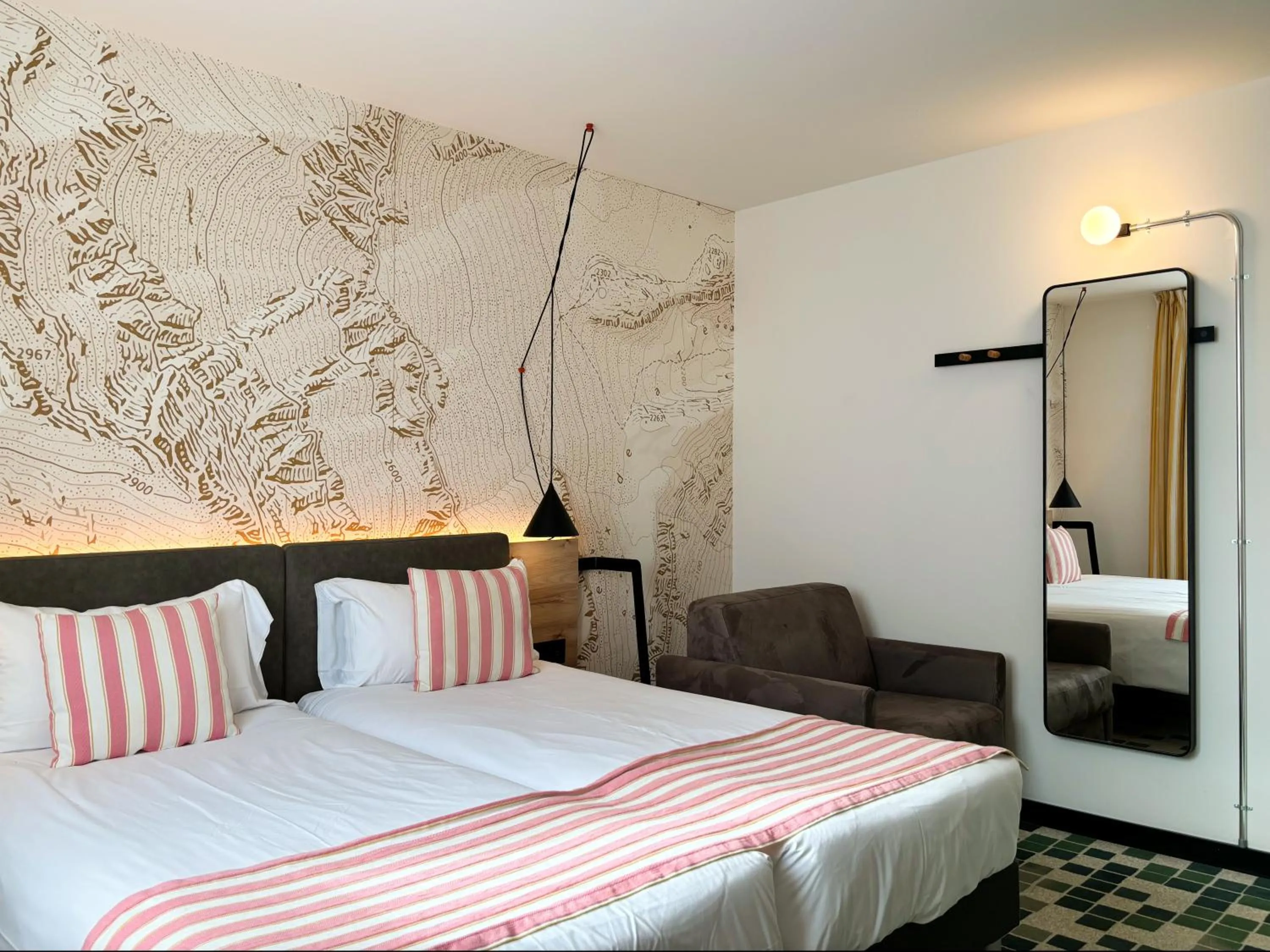 Bed in Nonanteneuf appart hōtel Sierre - contactless check-in