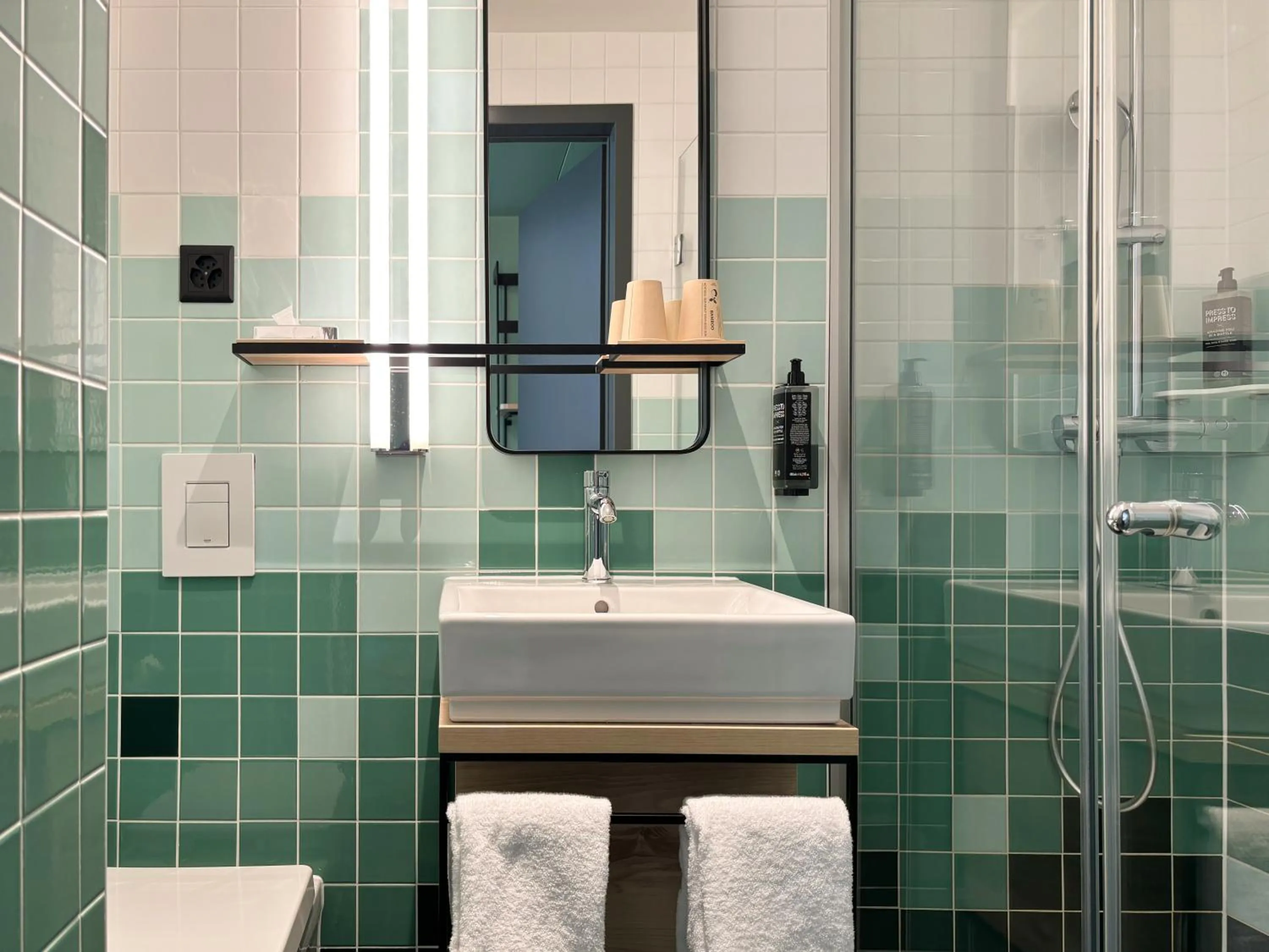 Bathroom in Nonanteneuf appart hōtel Sierre - contactless check-in