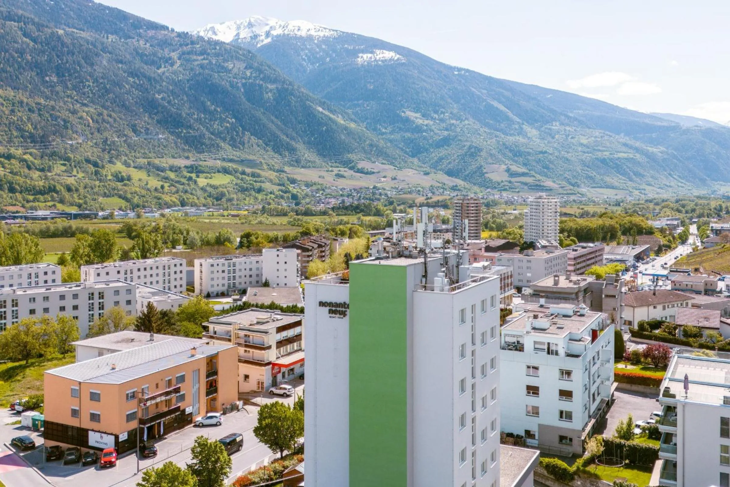 Property building in Nonanteneuf appart hōtel Sierre - contactless check-in