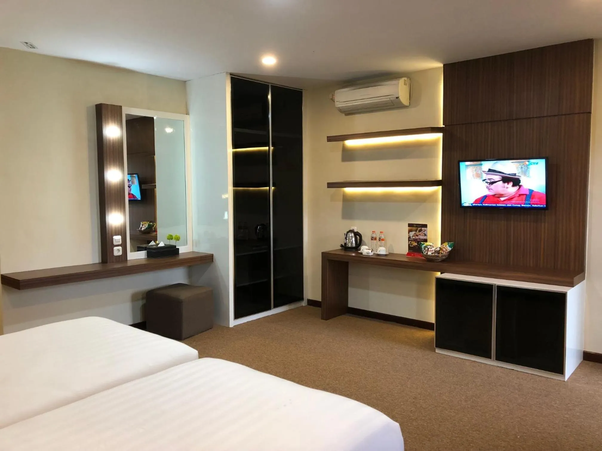 Bed in Grand Harvest Resort & Villas