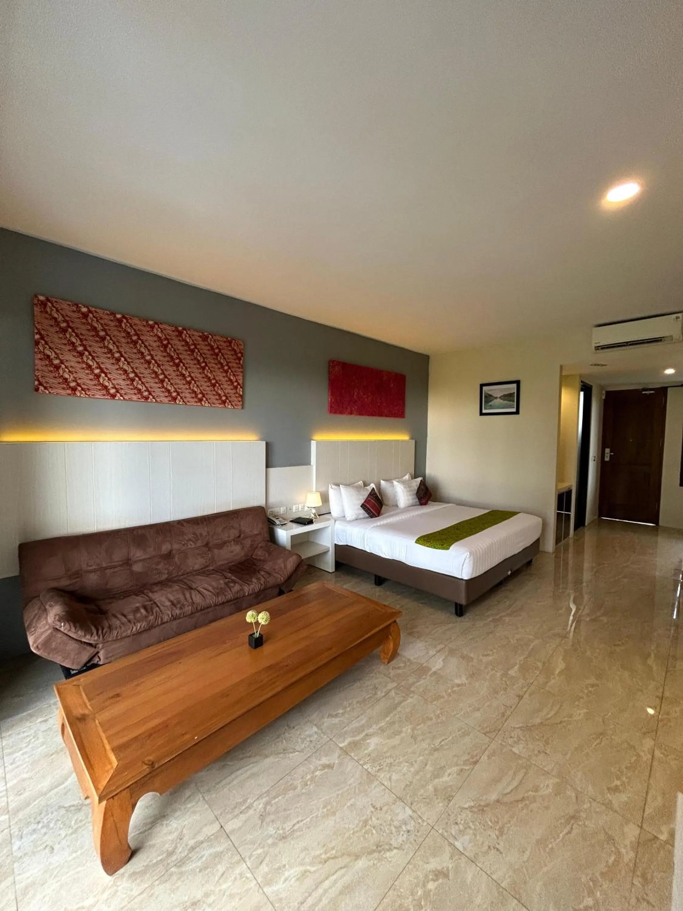 Bed in Grand Harvest Resort & Villas