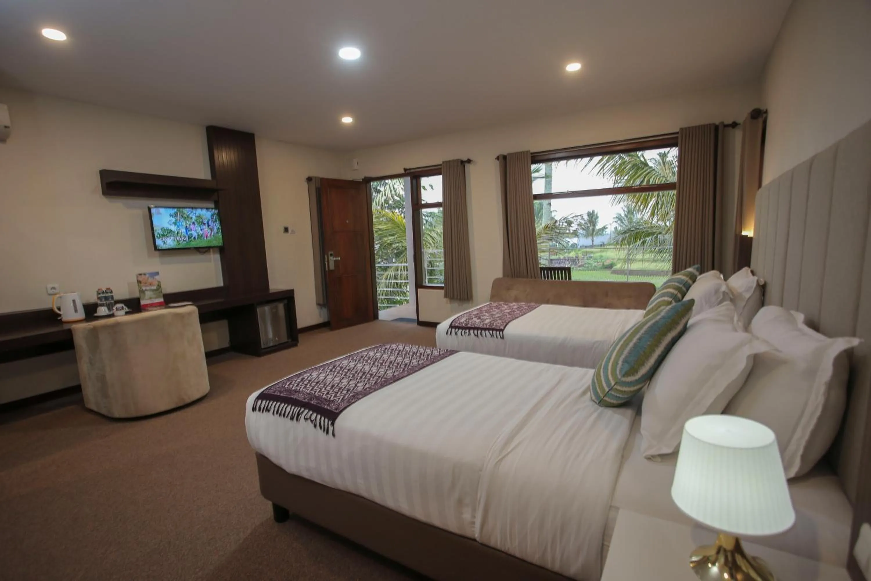 Bed in Grand Harvest Resort & Villas