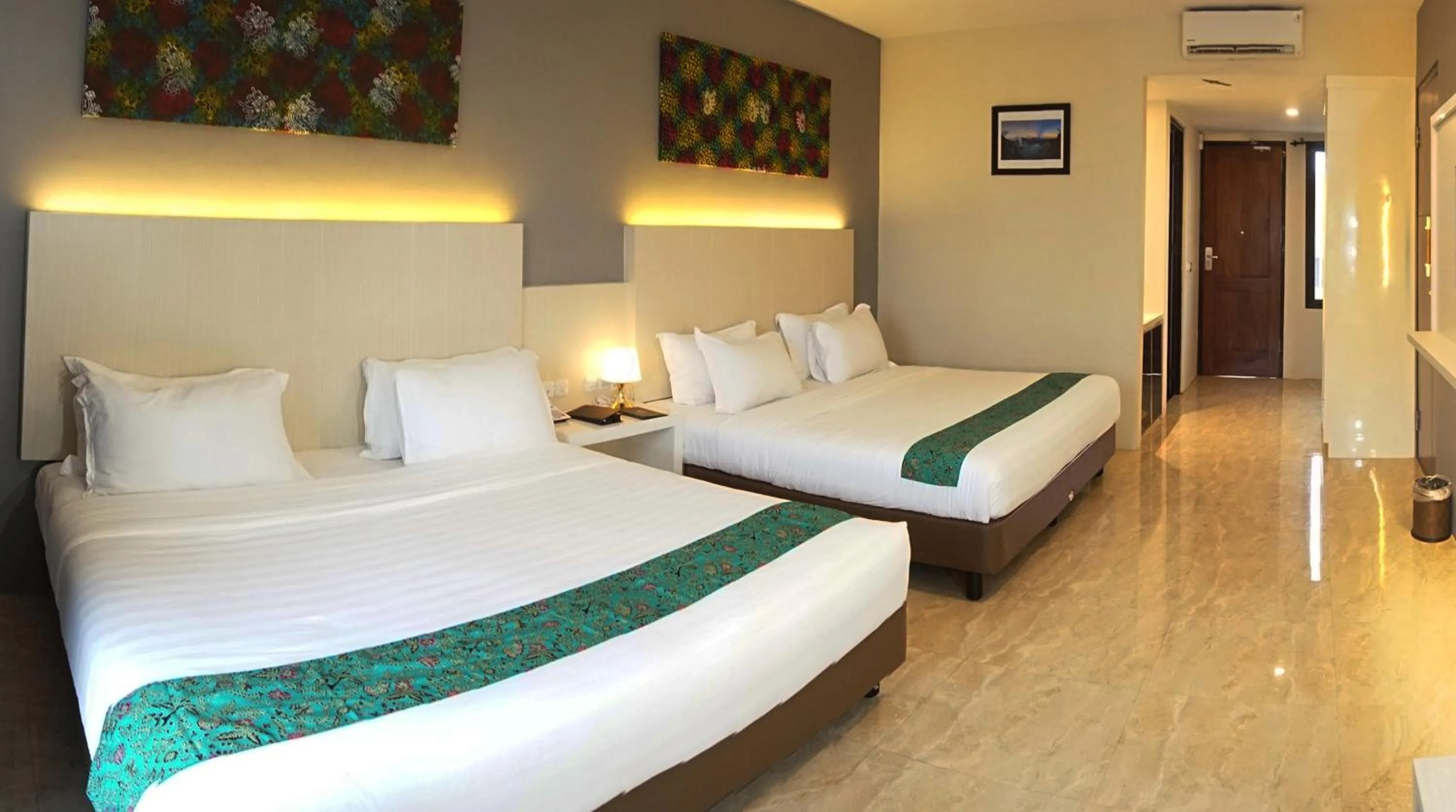 Bed in Grand Harvest Resort & Villas