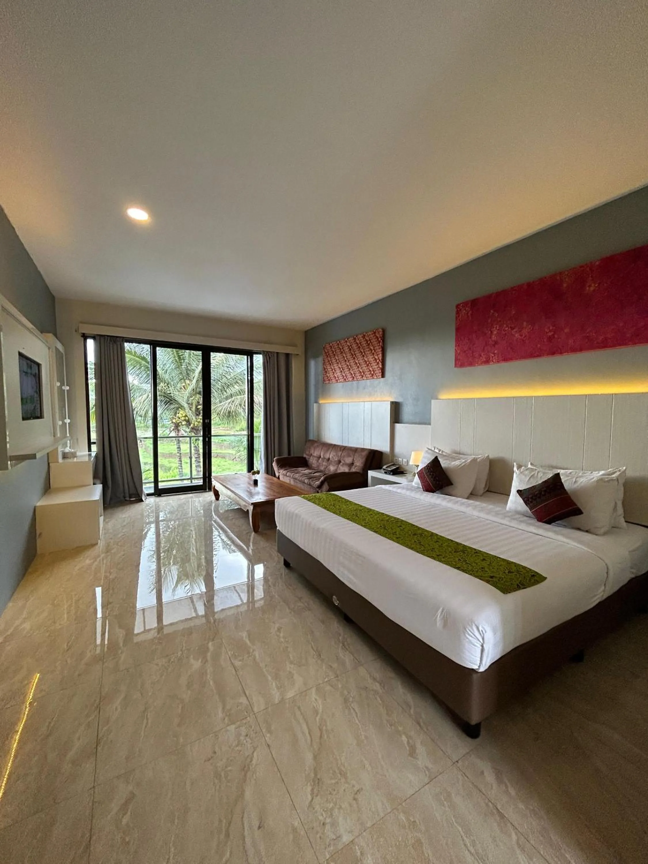 Bed in Grand Harvest Resort & Villas