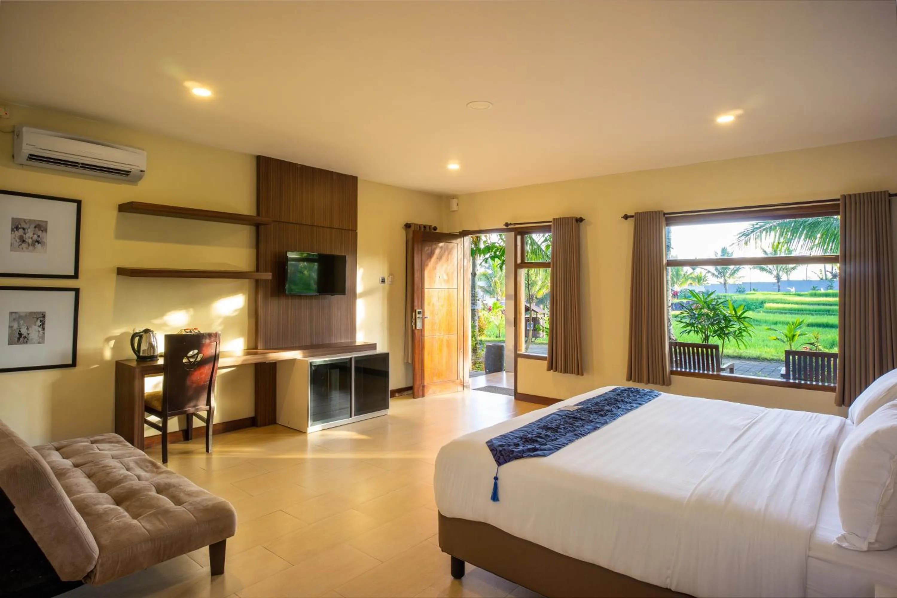 Bed in Grand Harvest Resort & Villas