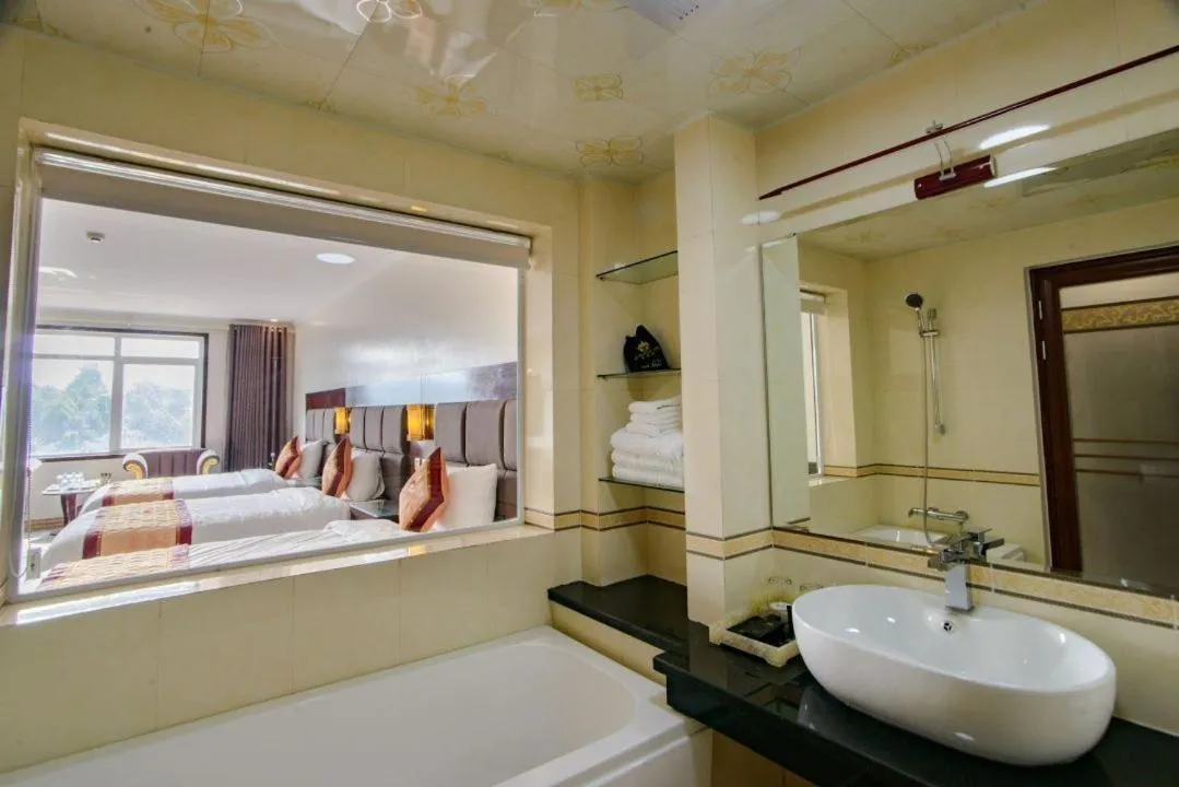 Bathroom, Bed in Lao Cai Royal Hotel