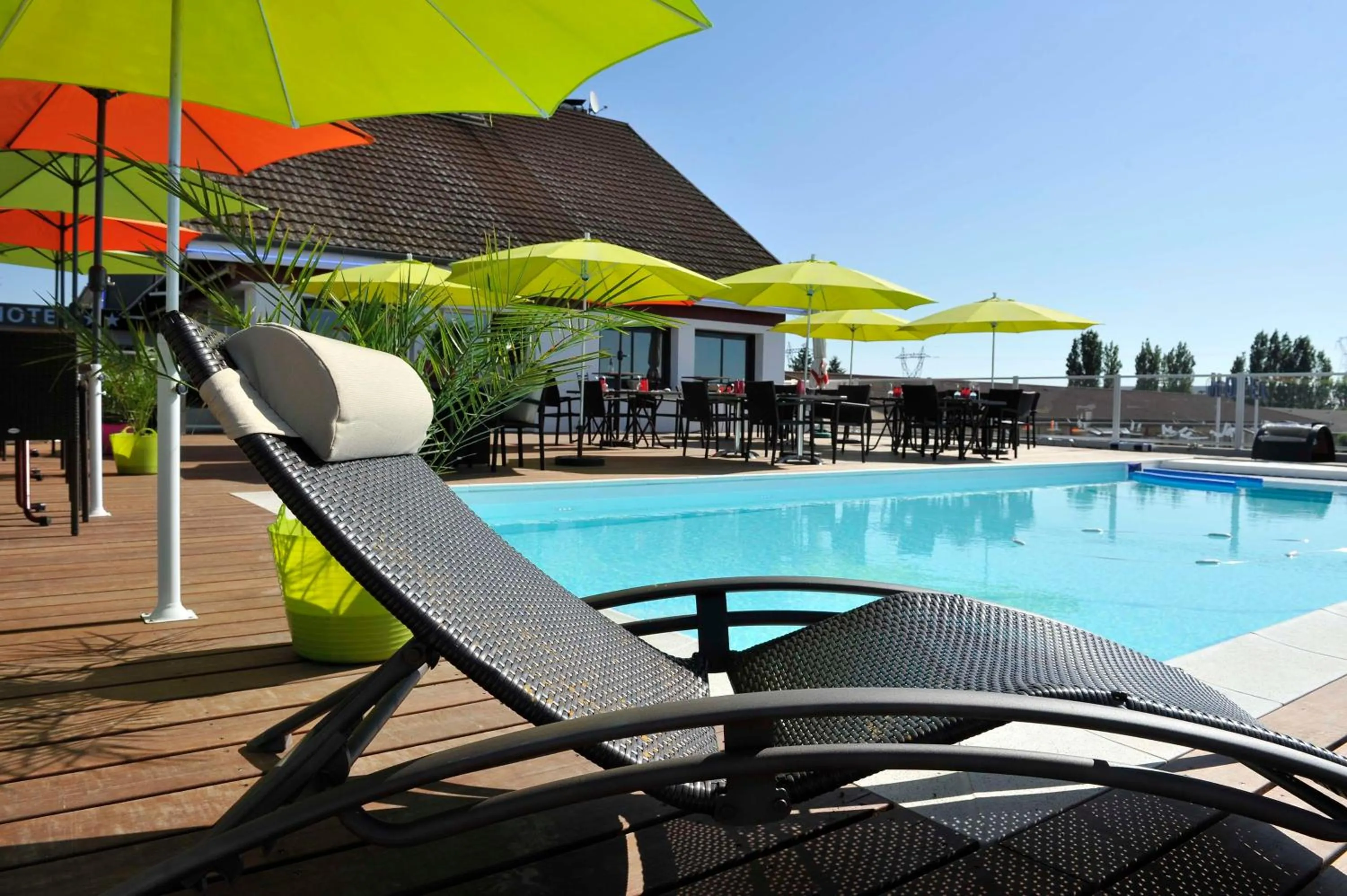 Pool view in Brit Hotel Dijon Hermes