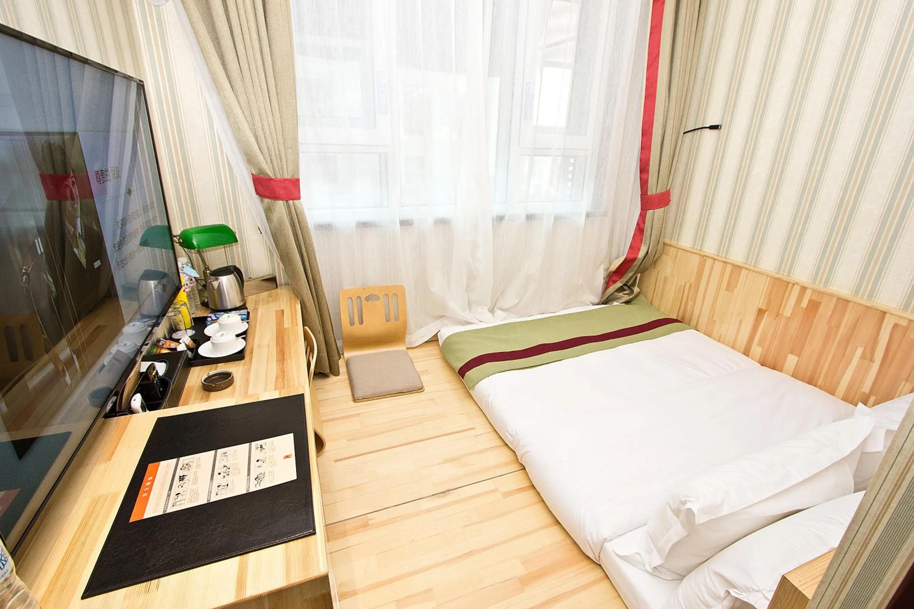 Photo of the whole room, Bed in Qingdao MG Hotel l Walking distance to the beach & railway station & St Michaels Cathedral