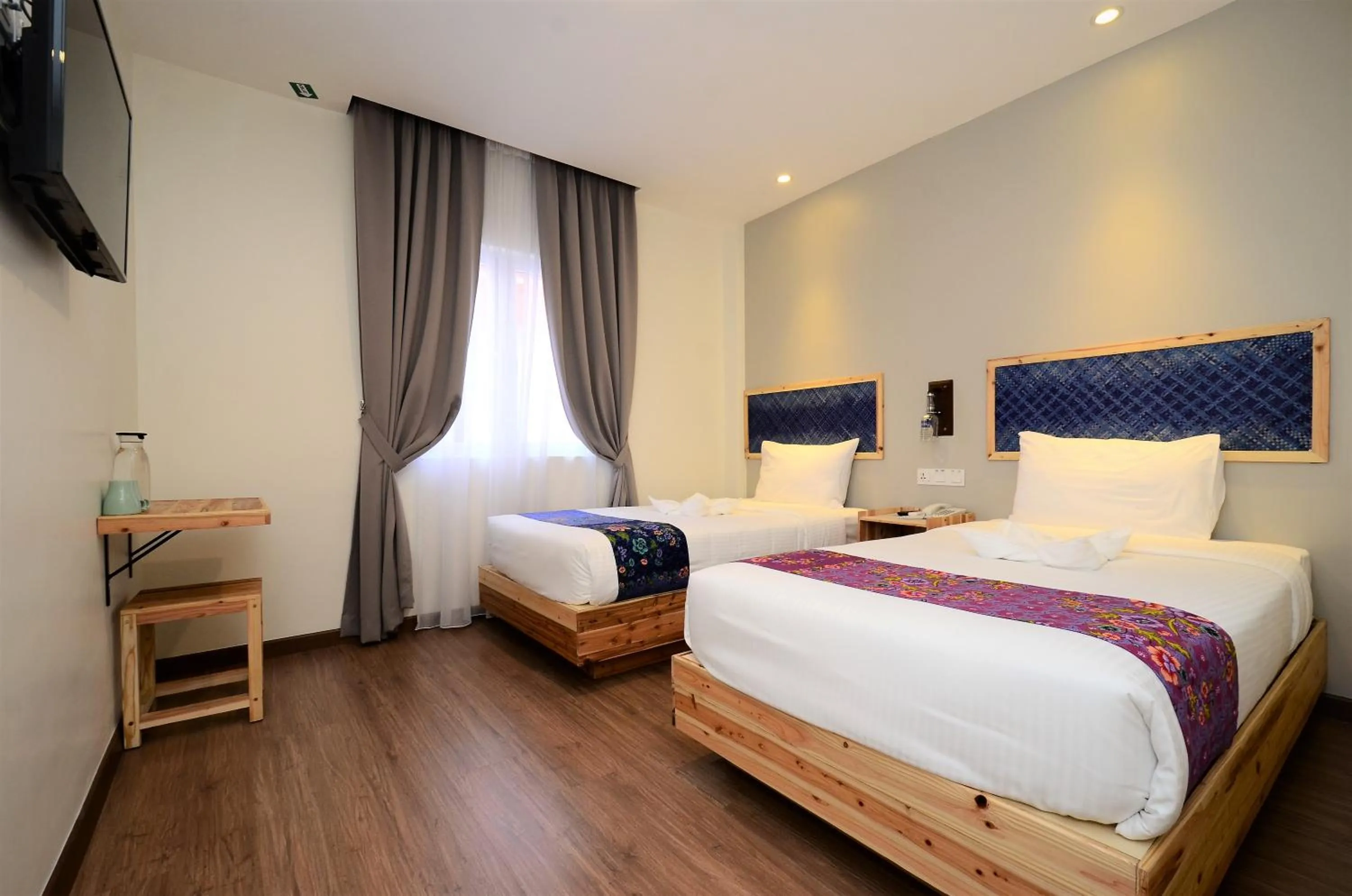 Bed in Artisan Eco Hotel