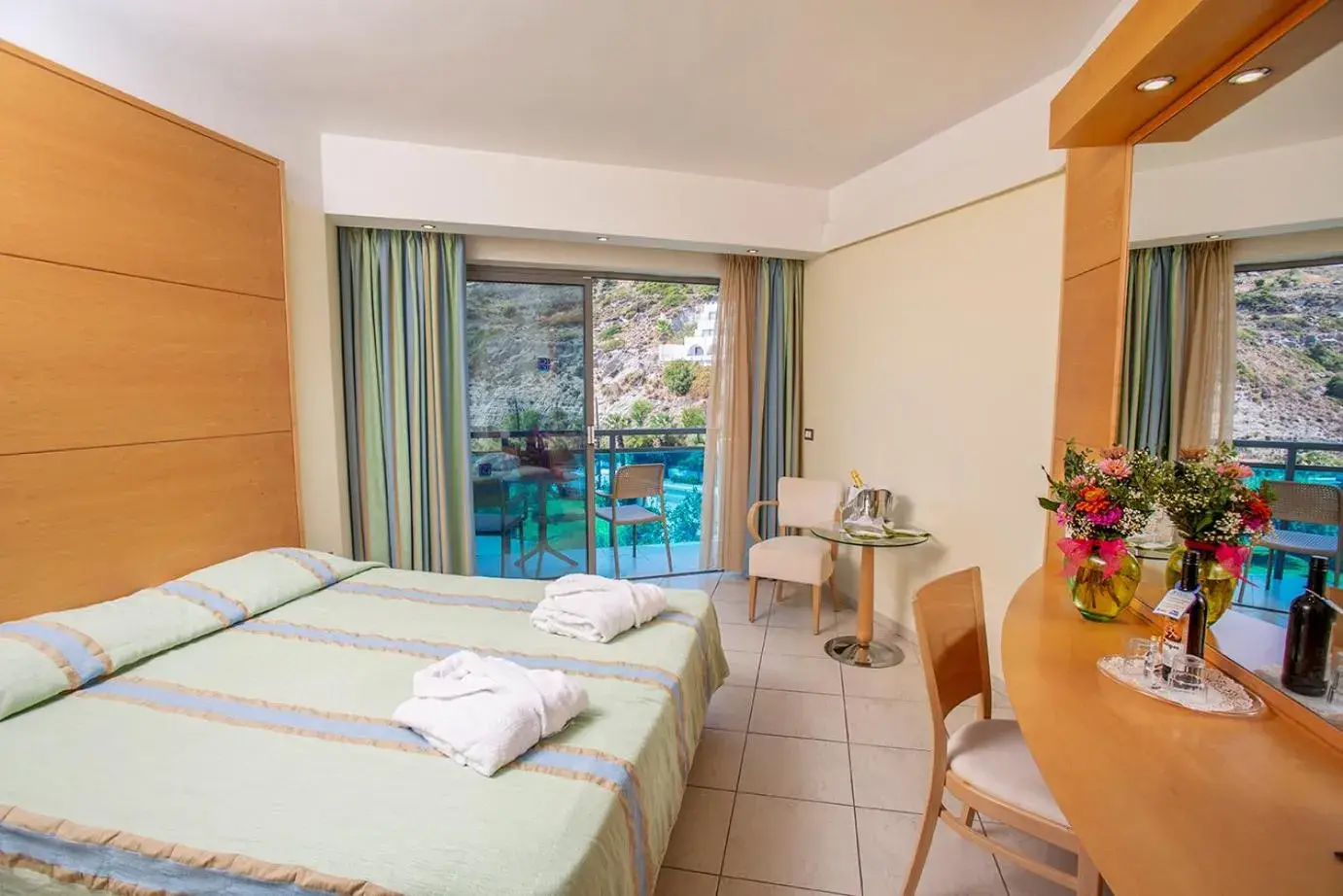 View (from property/room), Bed in Calypso Beach View (from property/room), Bed in Calypso Beach