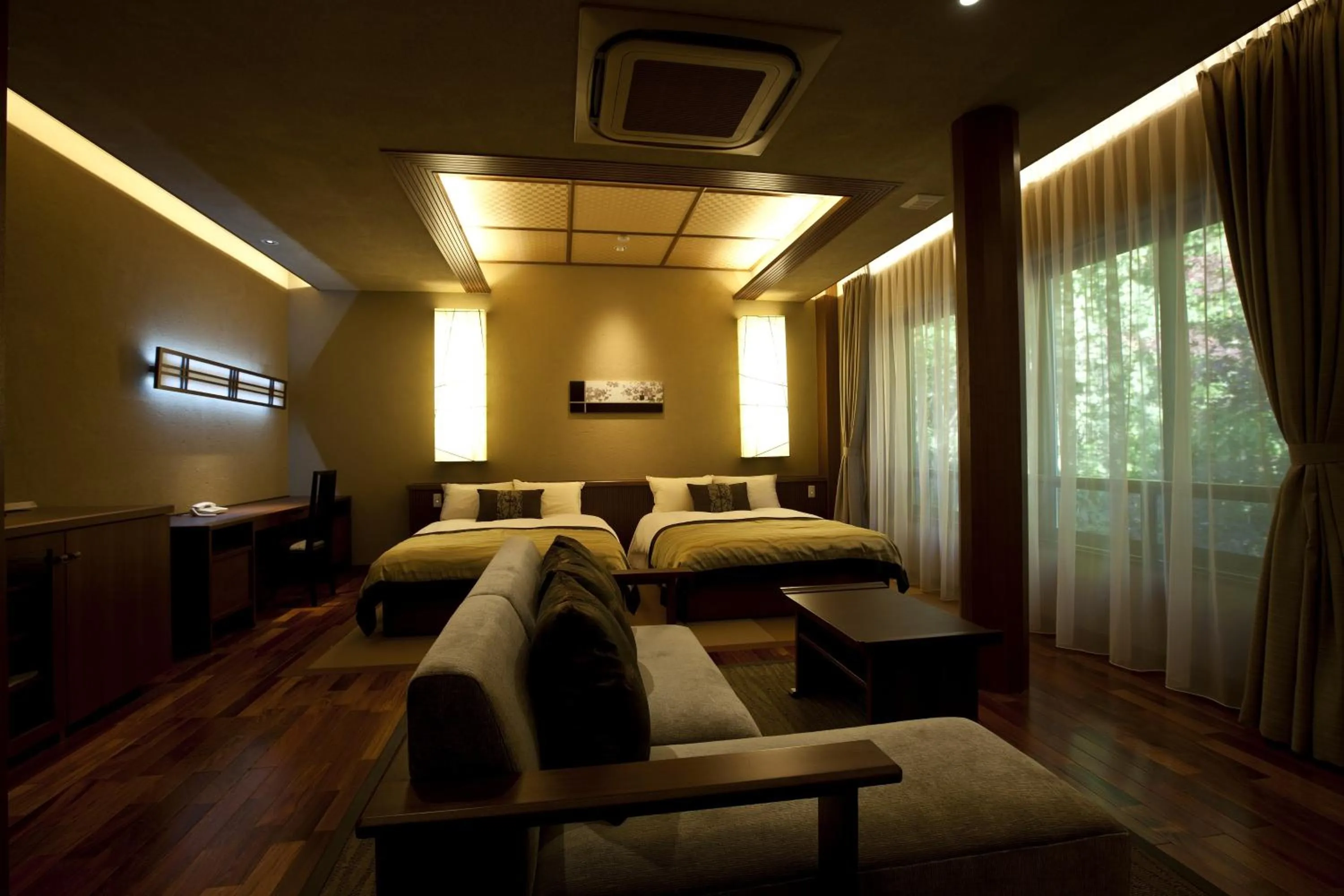 Photo of the whole room, Bed in TAKITEI Riverside Onsen ーA Hidden Ryokan in Kanazawaー