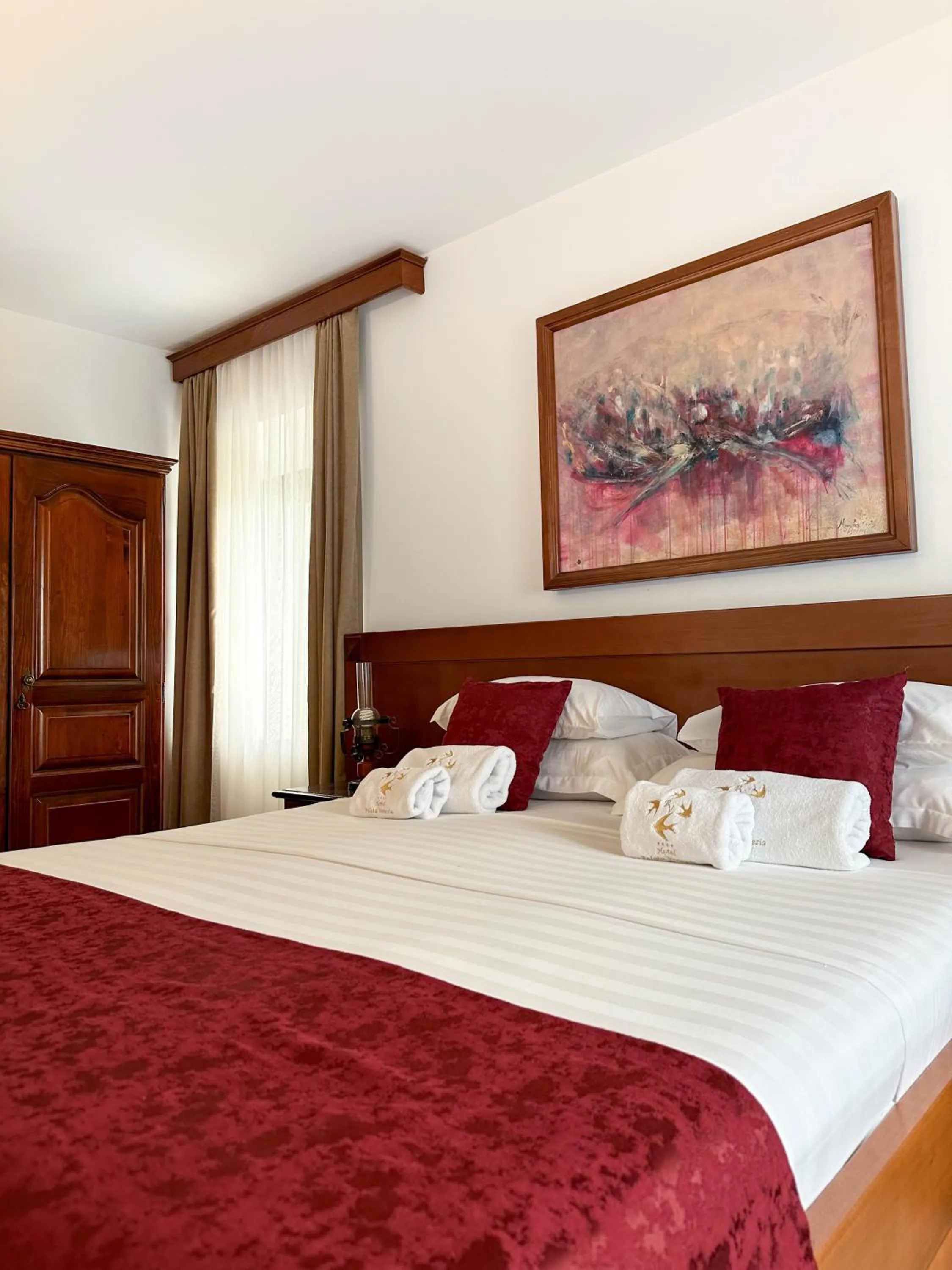 Bed in Hotel Palata Venezia
