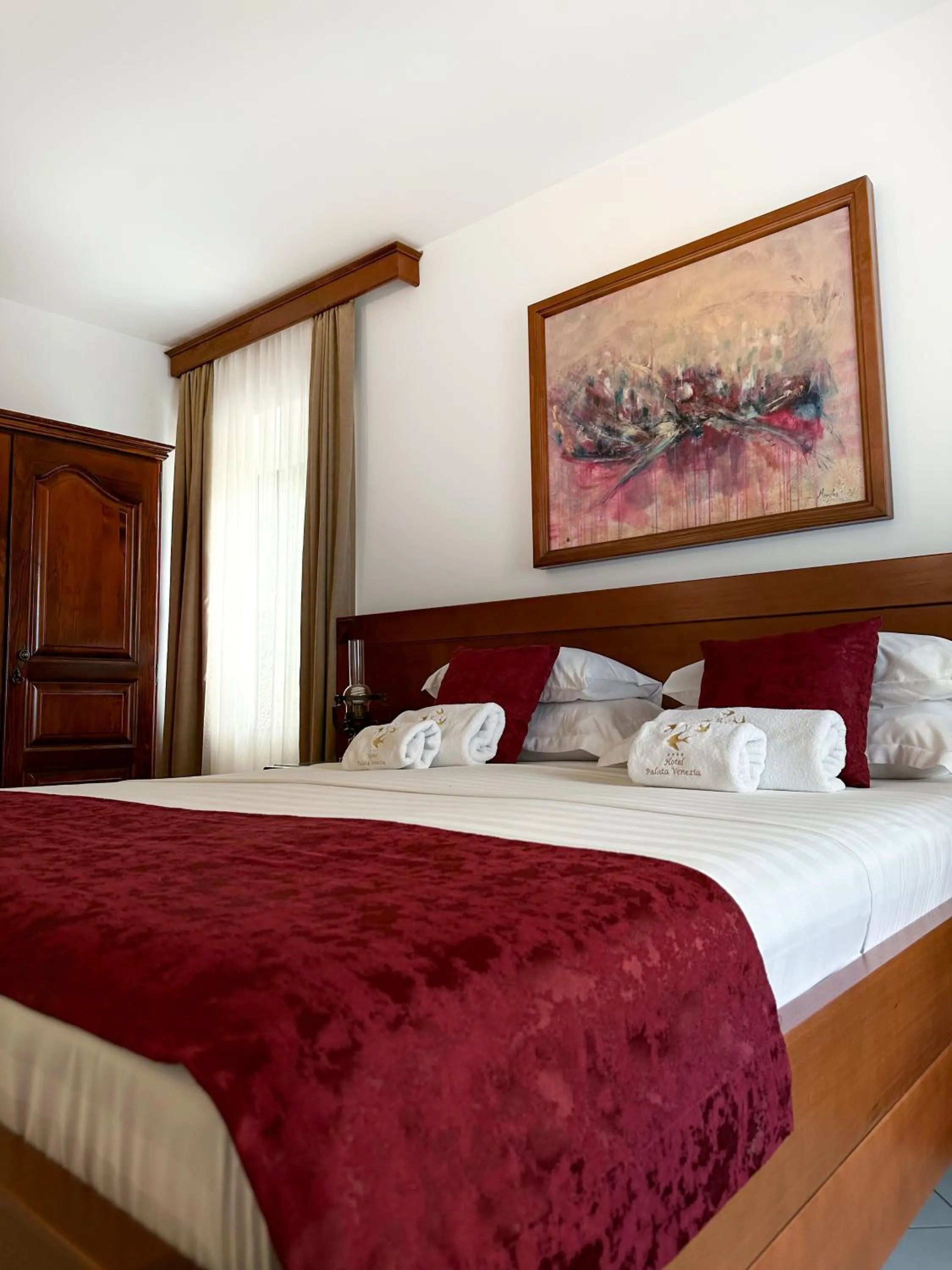 Bed in Hotel Palata Venezia