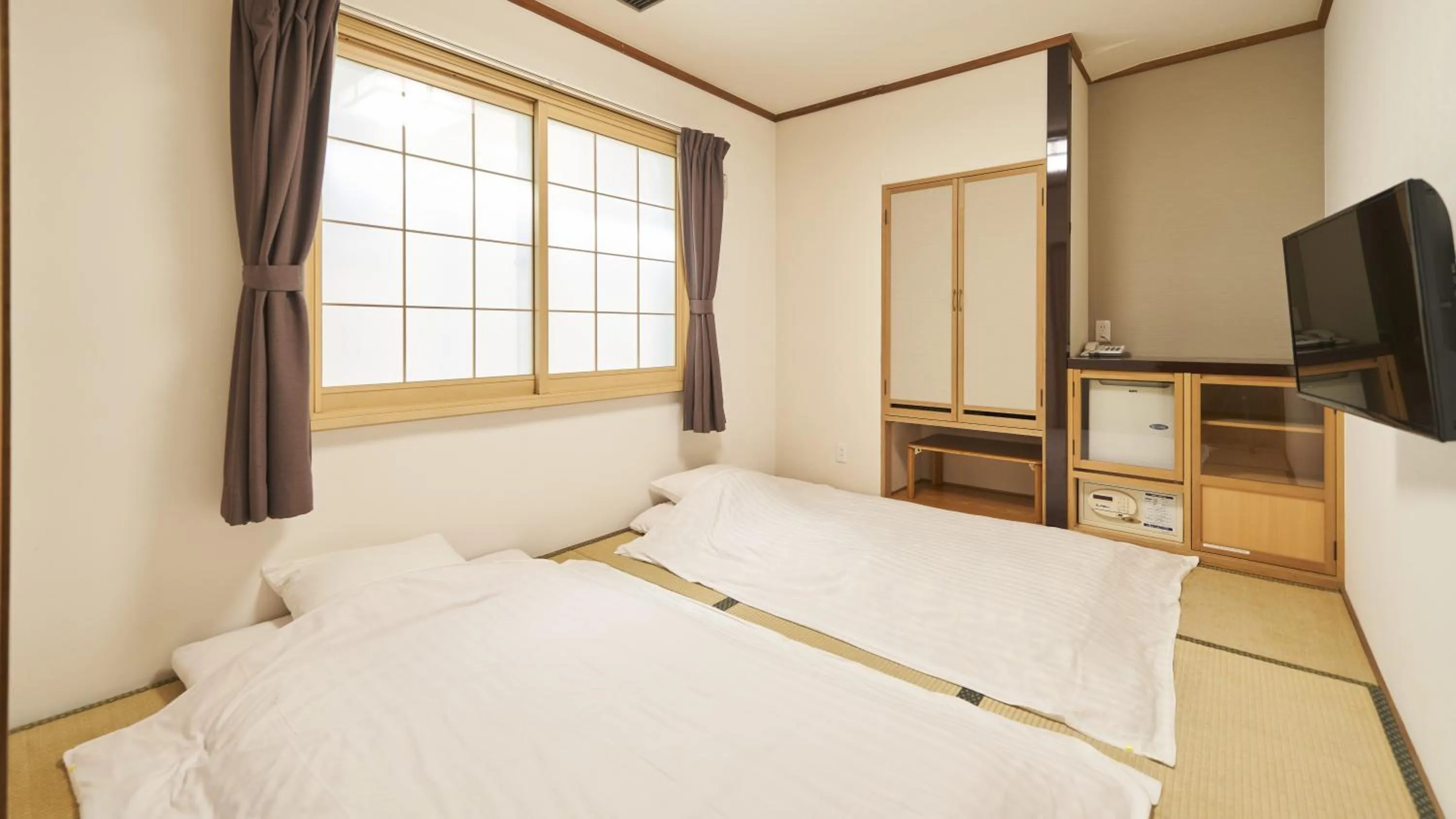 Photo of the whole room, Bed in Hotel Paco Obihiro Ekimae