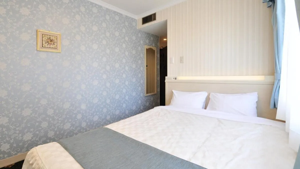 Photo of the whole room, Bed in Hotel Paco Obihiro Ekimae