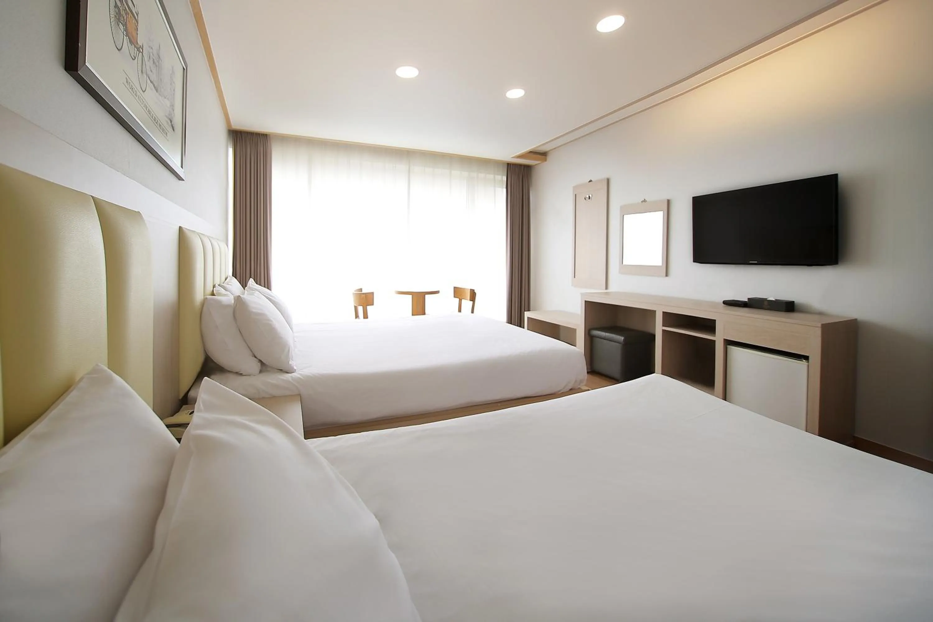 Bed in Shin Shin Hotel Jeju City