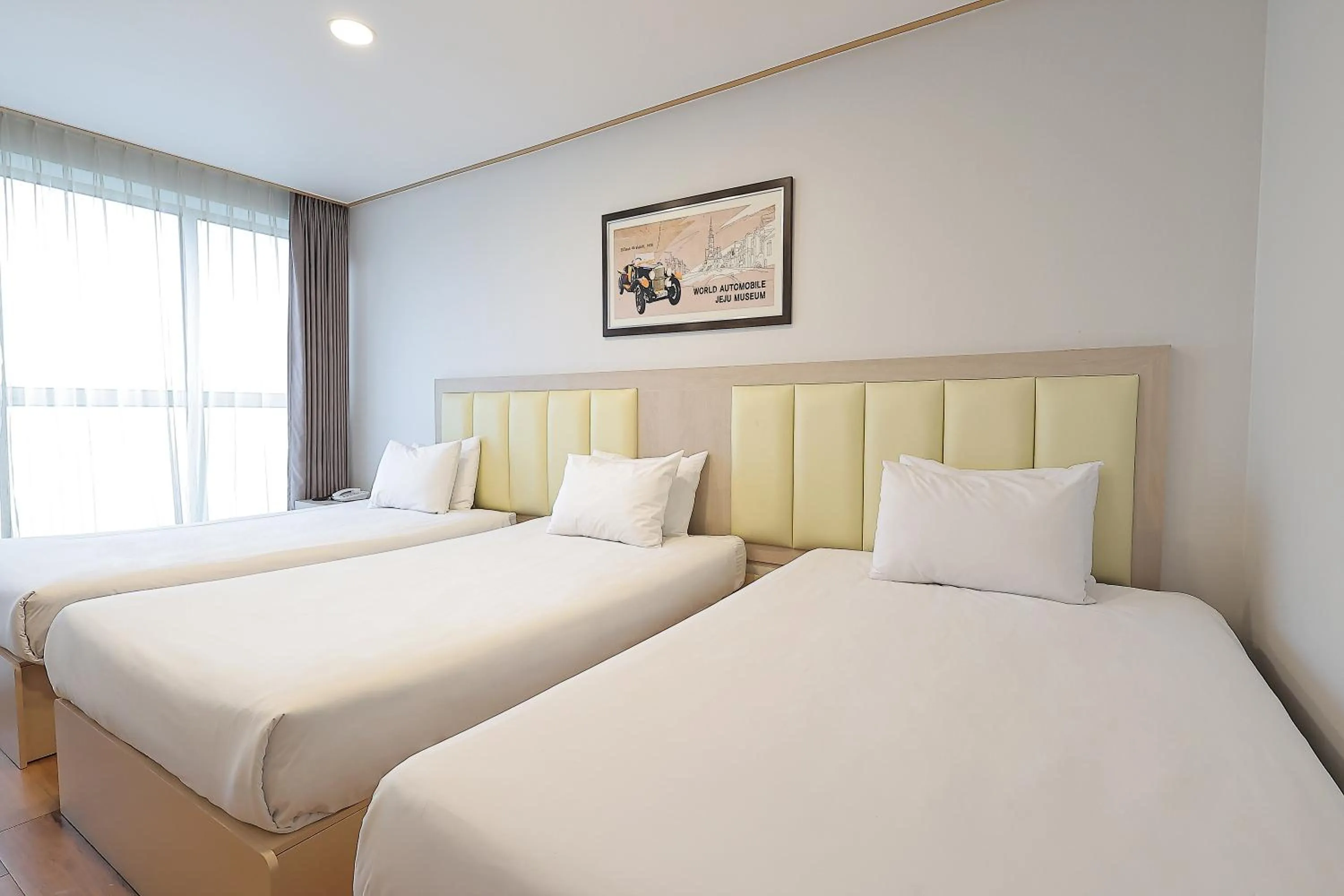 Bed in Shin Shin Hotel Jeju City