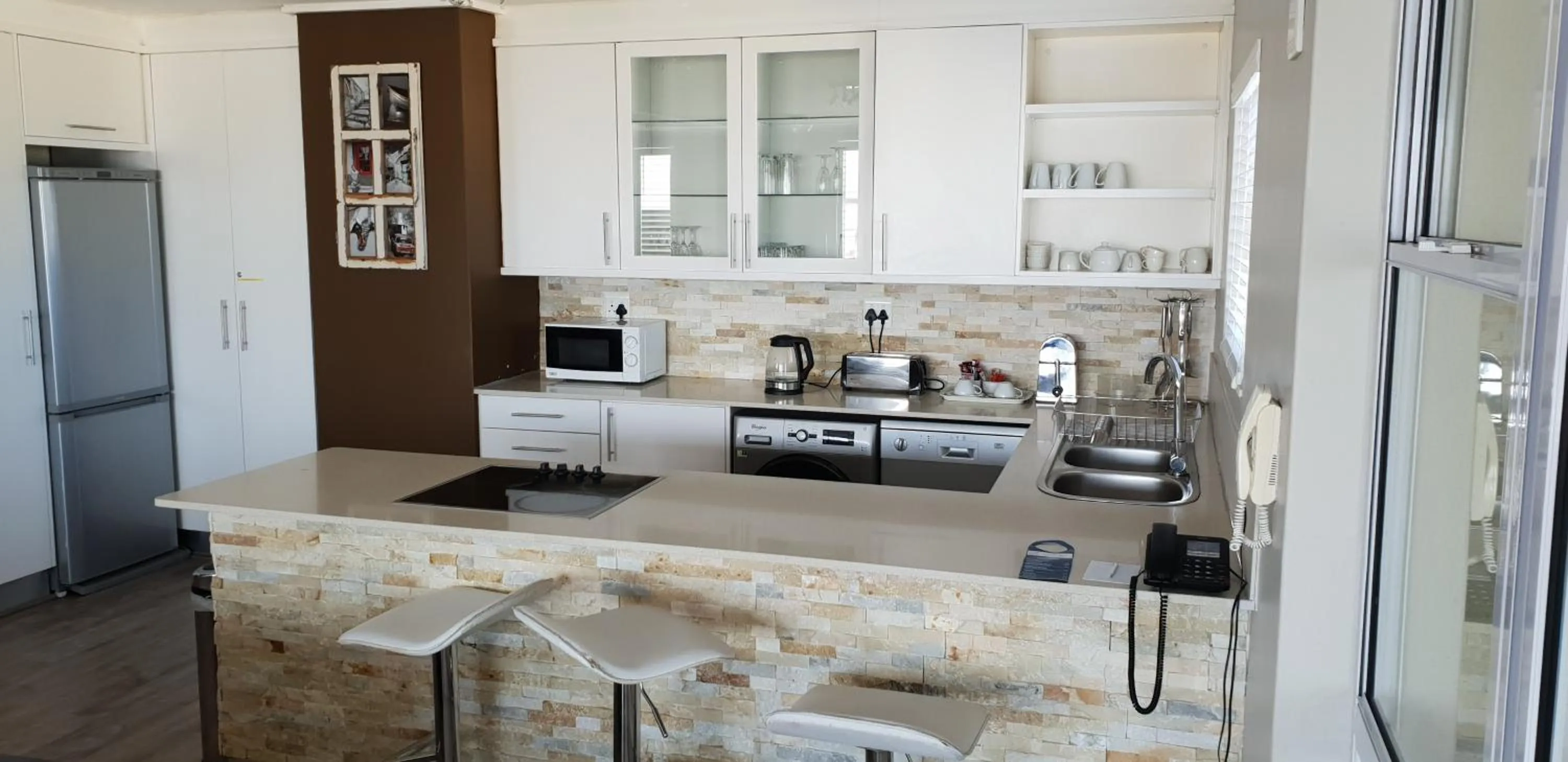 Kitchen or kitchenette in Lagoon Beach Hotel Apartments