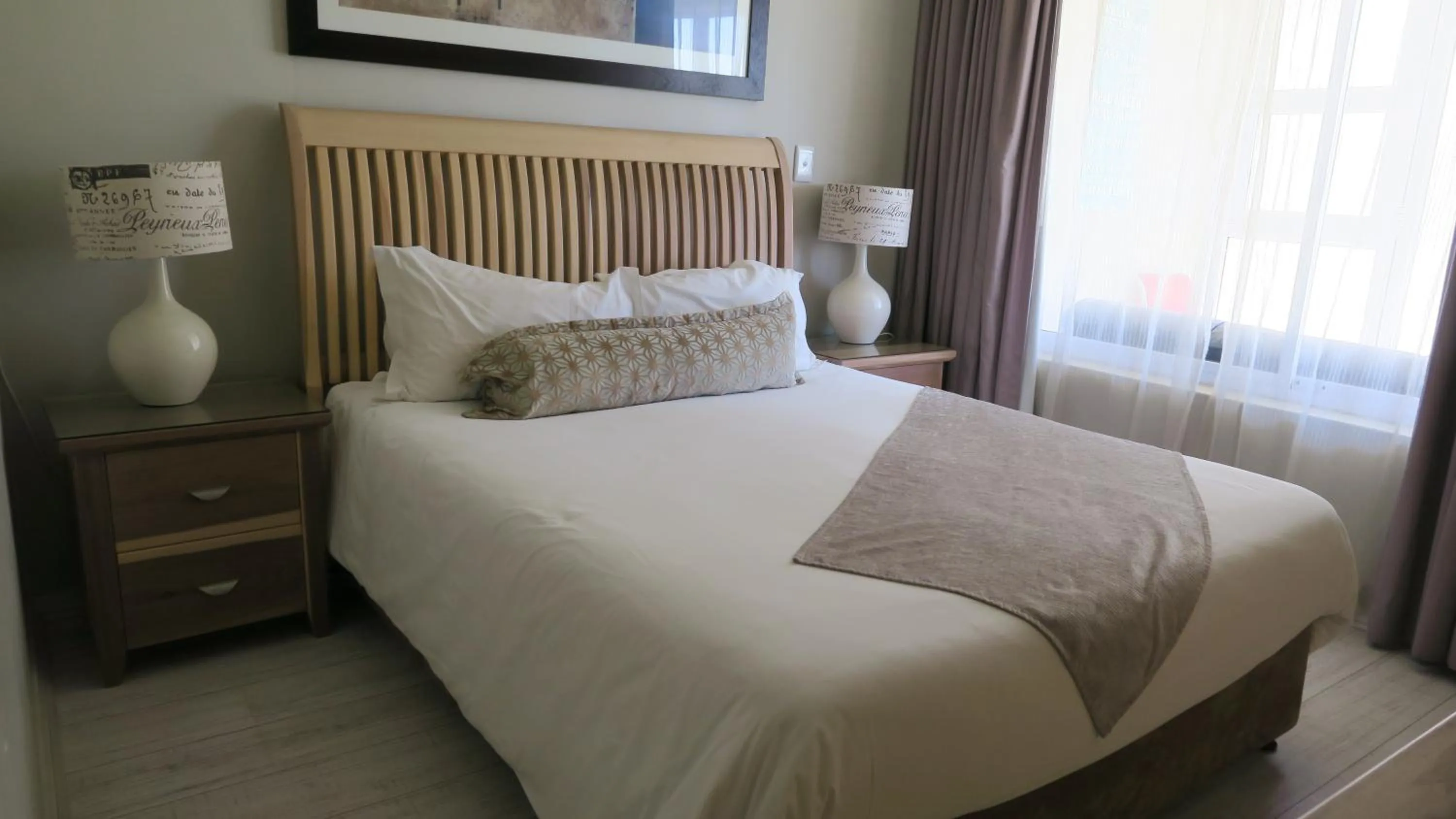 Bed in Lagoon Beach Hotel Apartments