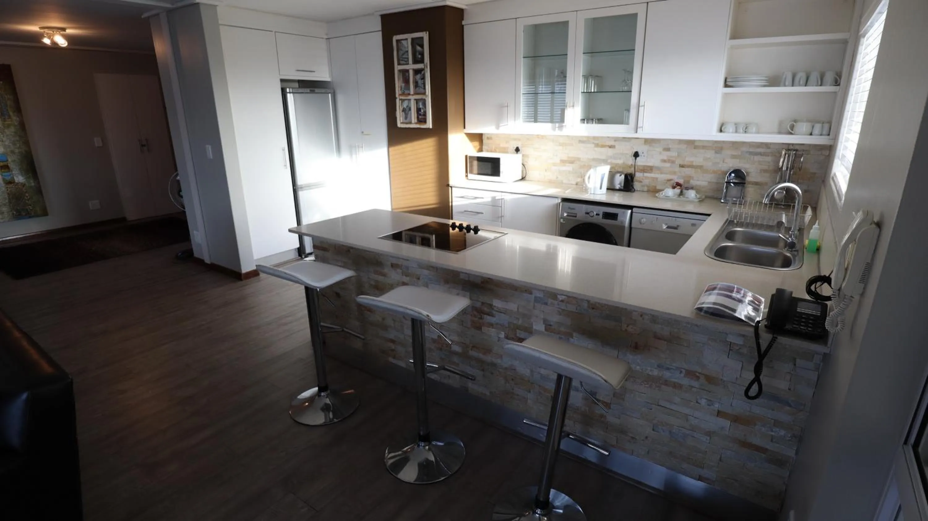 Kitchen or kitchenette in Lagoon Beach Hotel Apartments