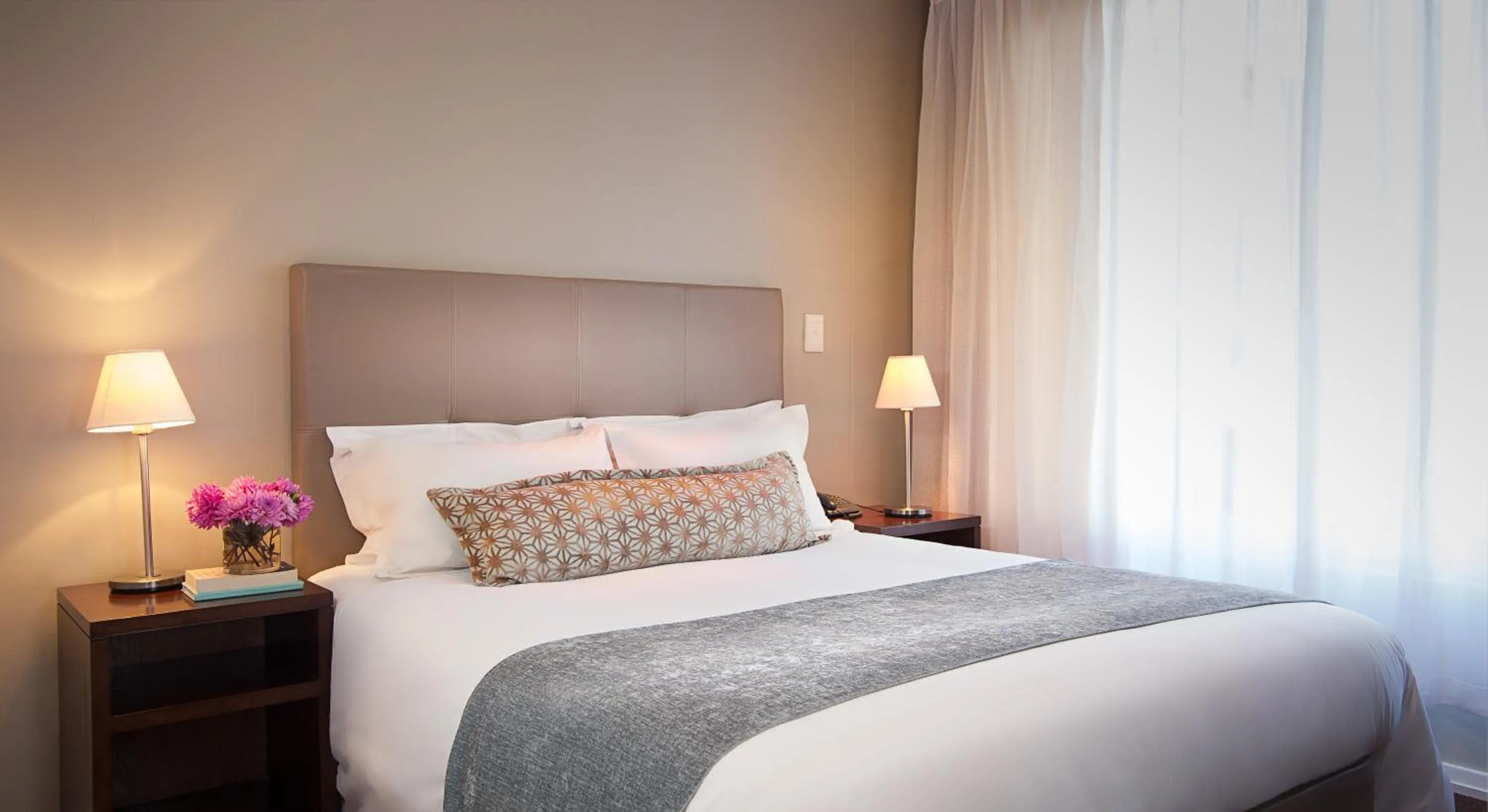 Bed in Lagoon Beach Hotel Apartments