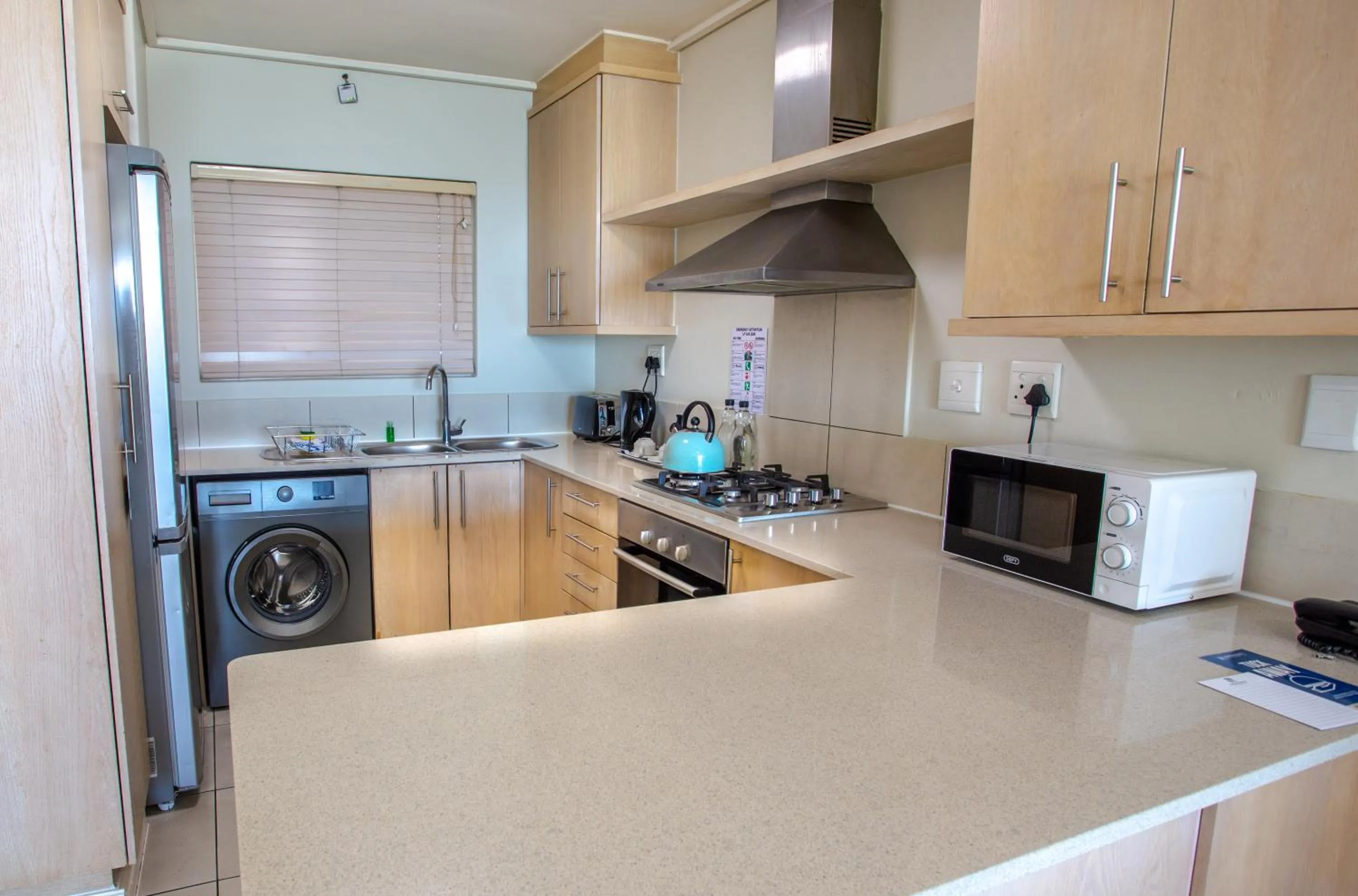 Kitchen or kitchenette in Lagoon Beach Hotel Apartments