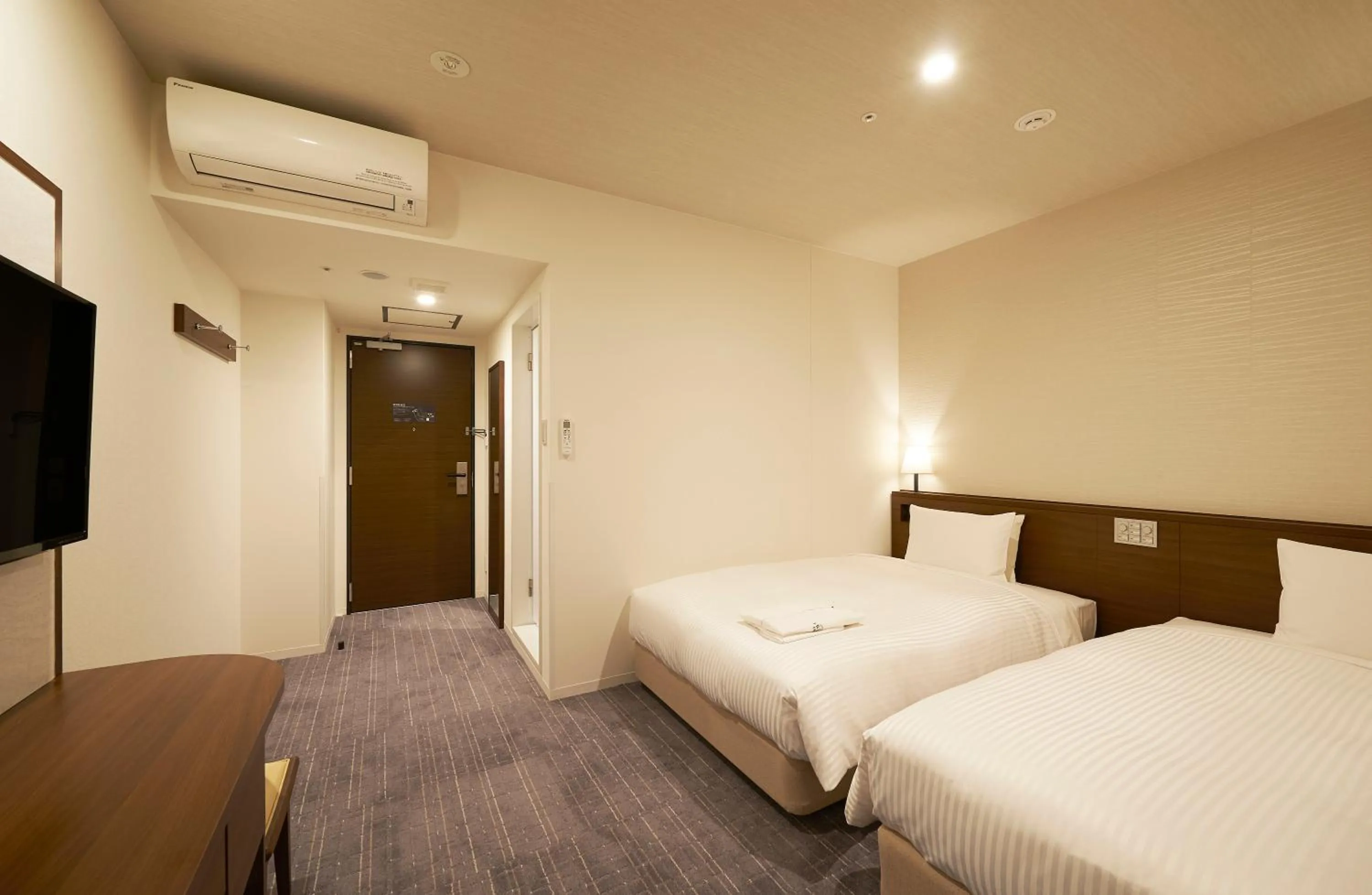 Bed in Sotetsu Fresa Inn Tokyo Roppongi