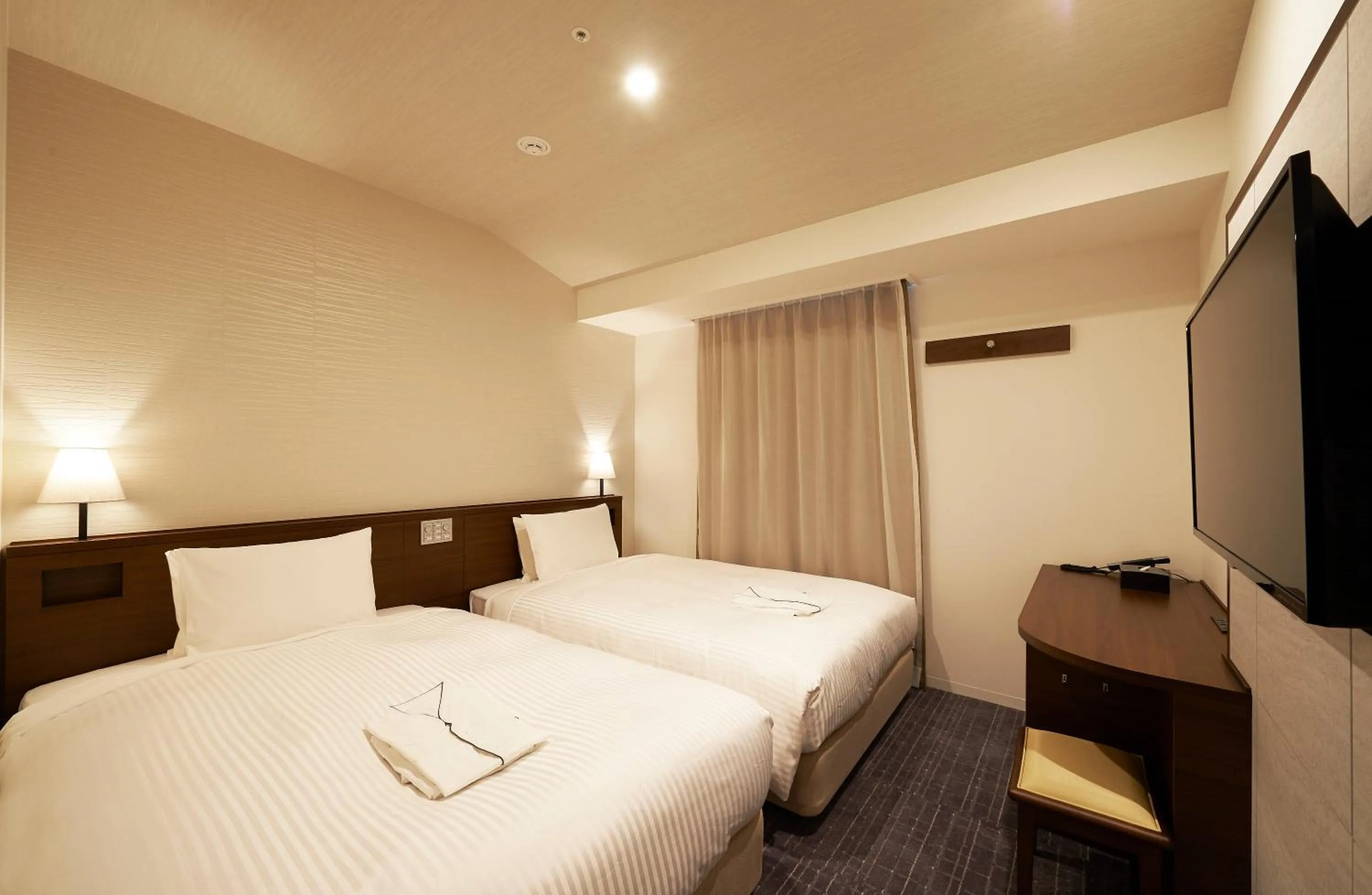 Bed in Sotetsu Fresa Inn Tokyo Roppongi