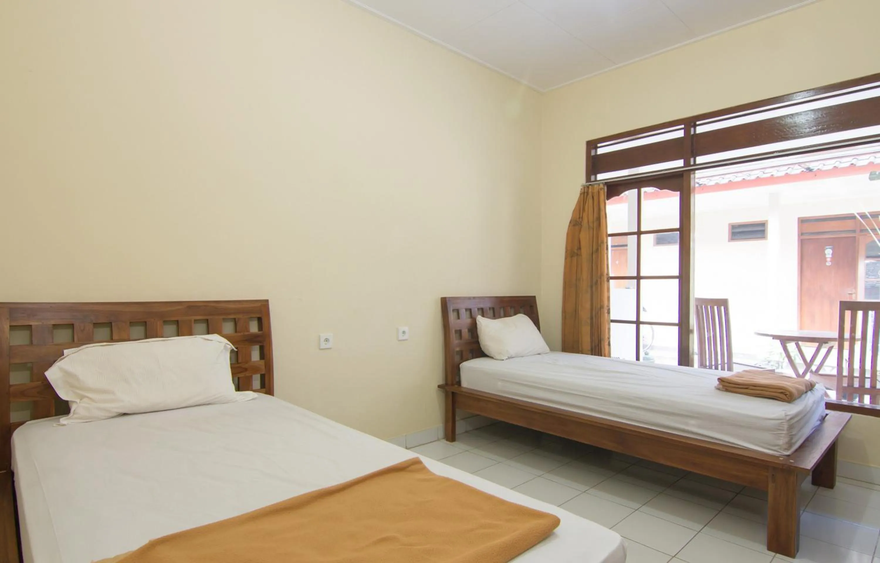 Bed in Pondok Nuri Homestay