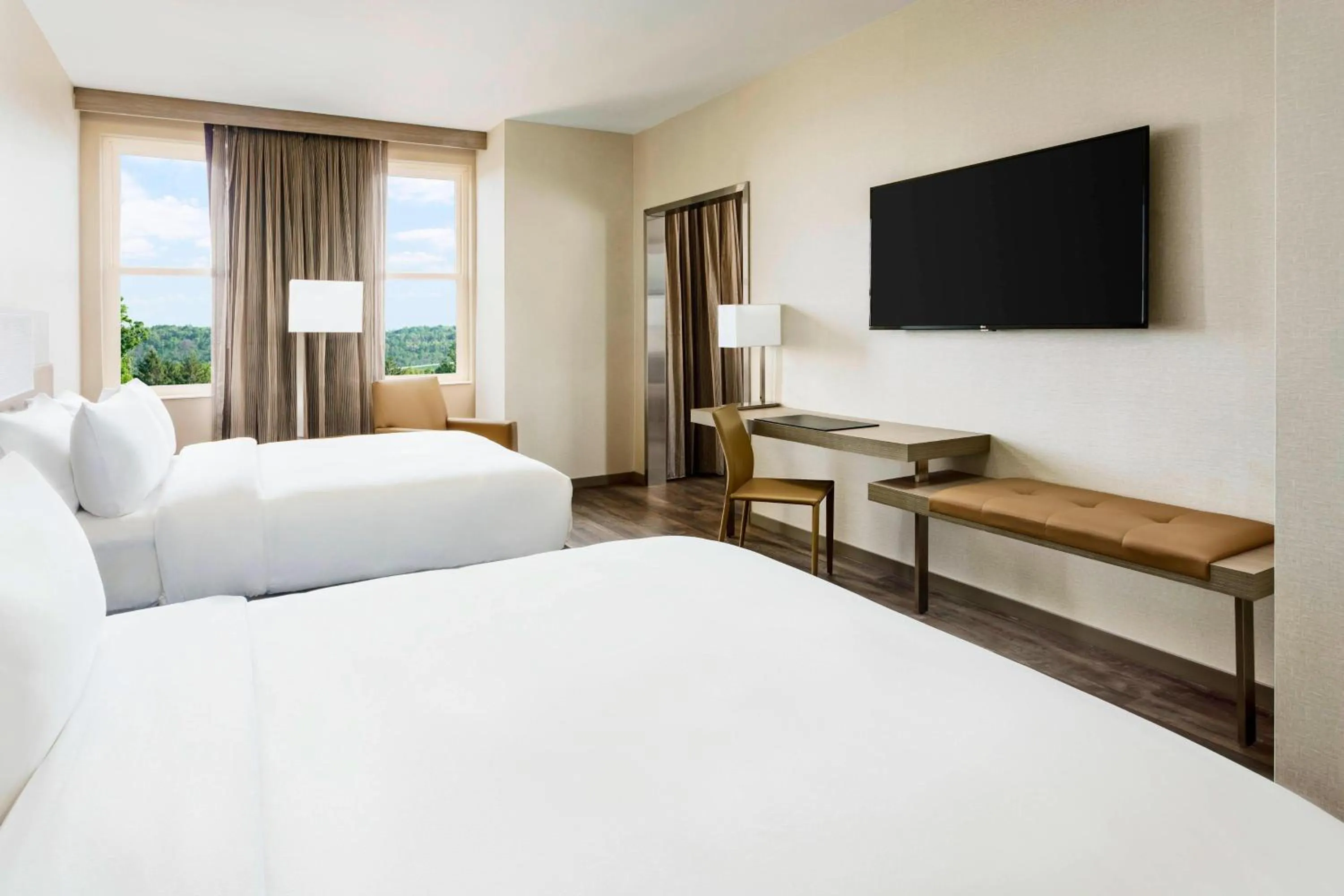 Photo of the whole room, Bed in AC Hotel by Marriott Spartanburg