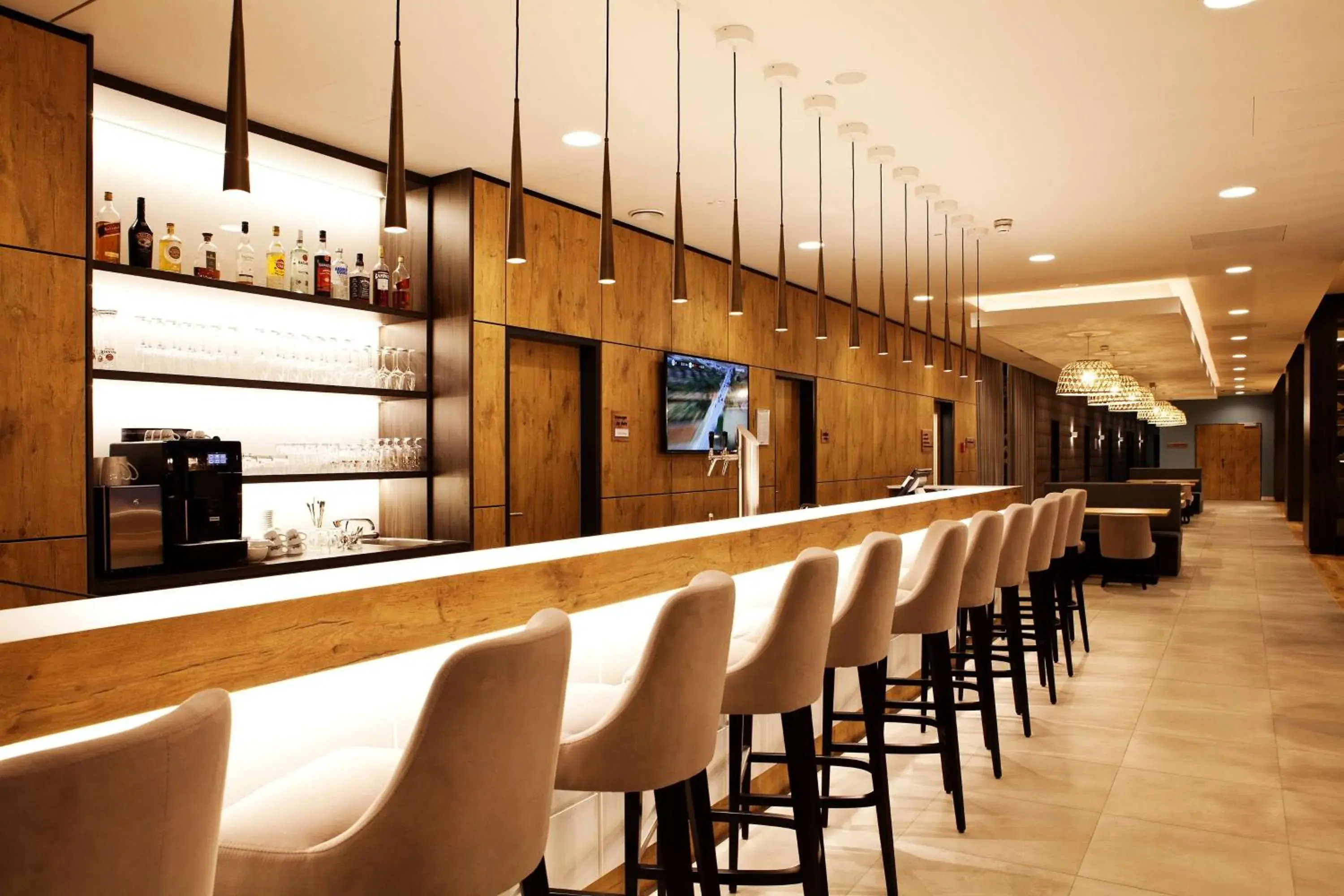 Lounge or bar in Hampton By Hilton Aachen Tivoli Lounge or bar in Hampton By Hilton Aachen Tivoli