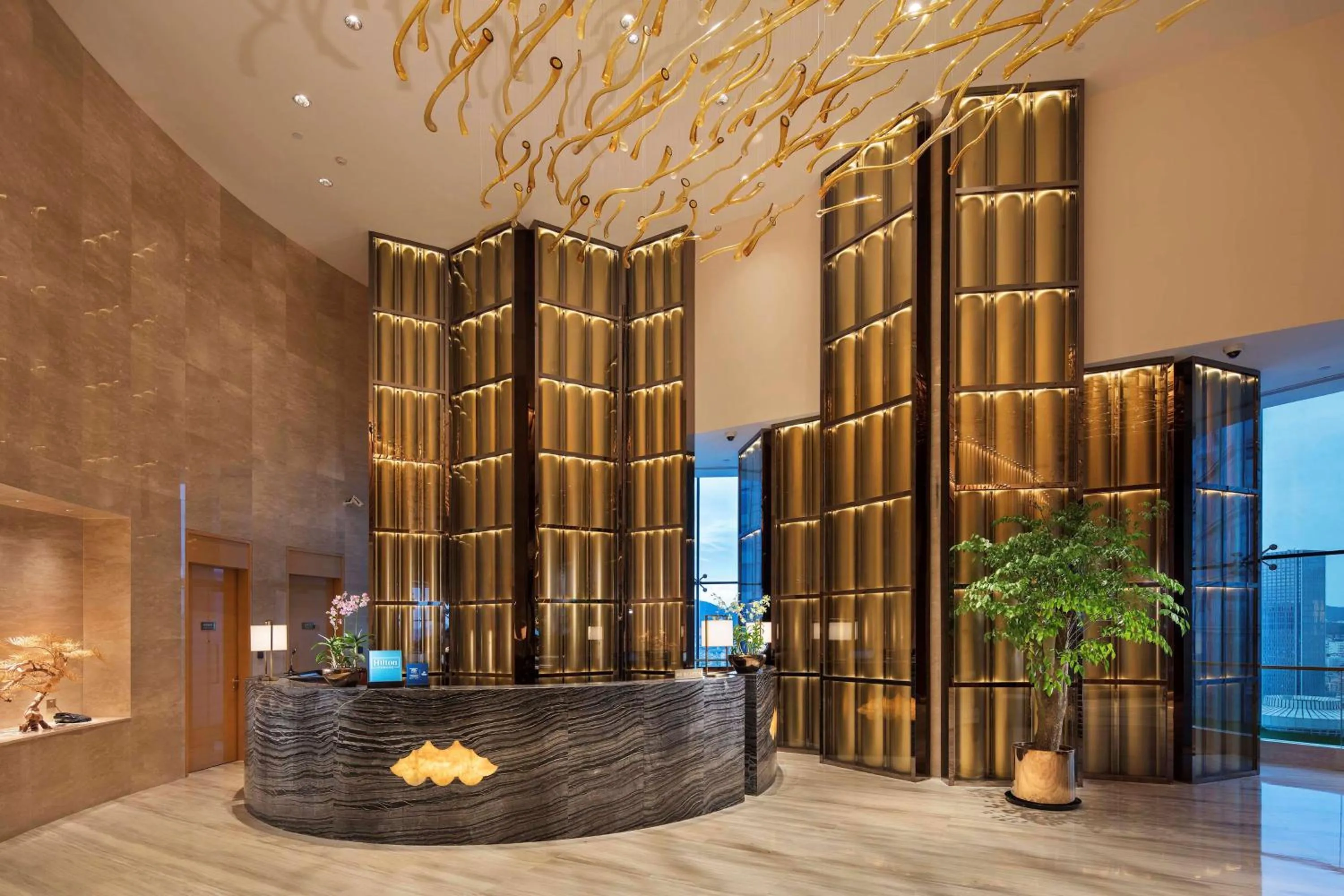 Lobby or reception in Hilton Yantai