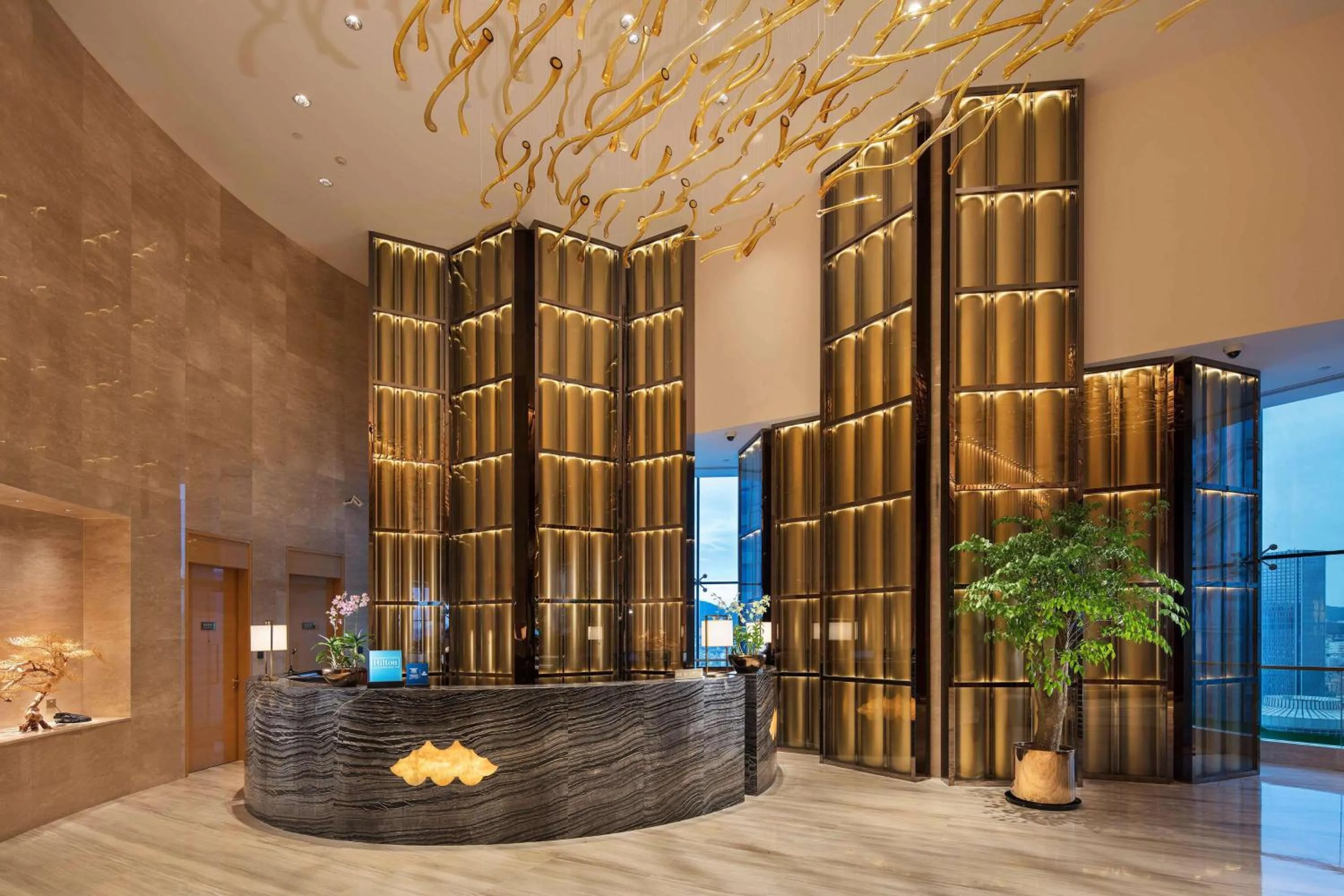 Lobby or reception in Hilton Yantai