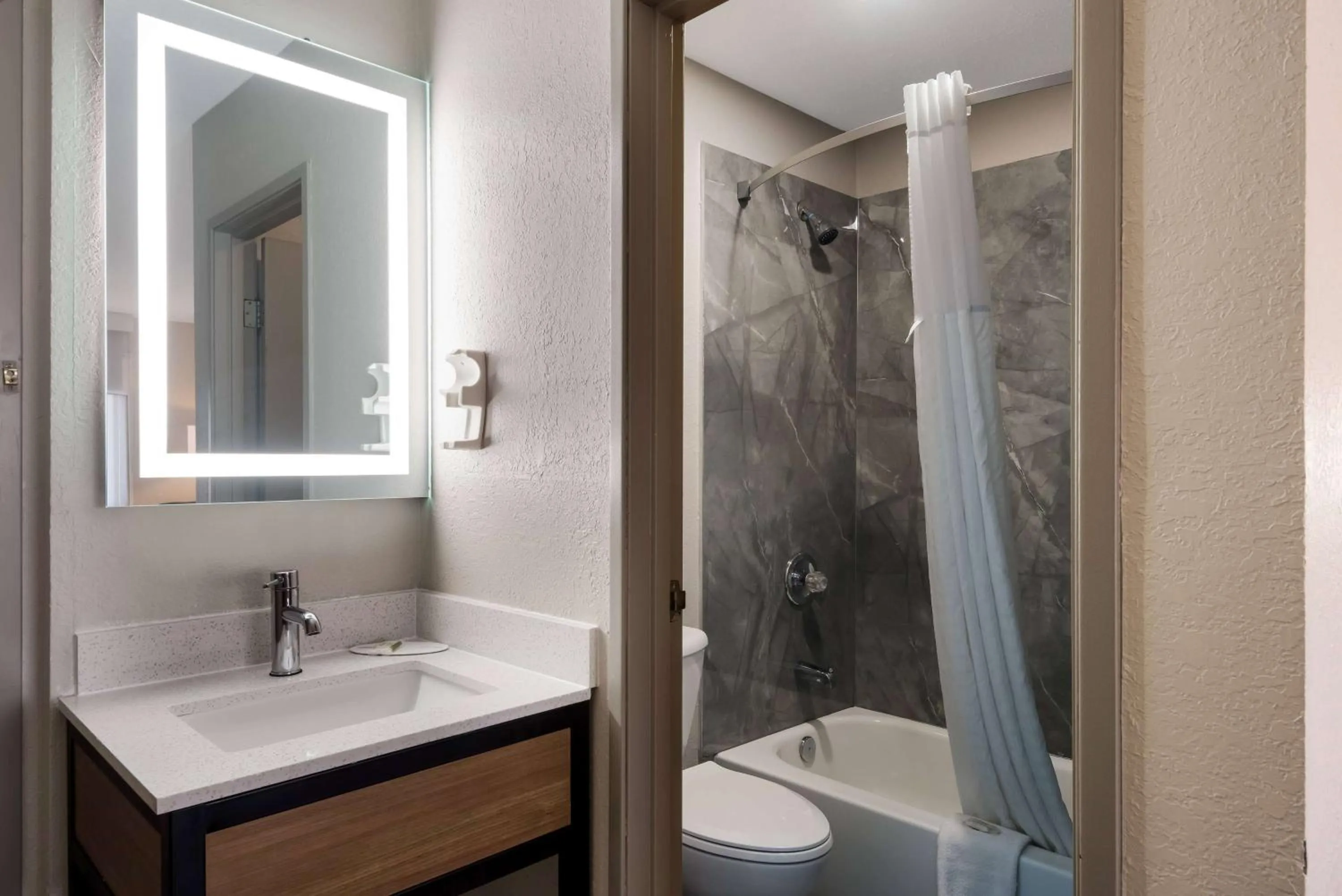 Bathroom in Days Inn by Wyndham Ankeny - Des Moines
