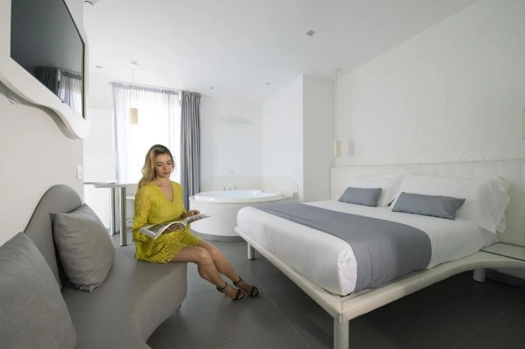 Bed in Gatto Bianco Mia Aparthotel